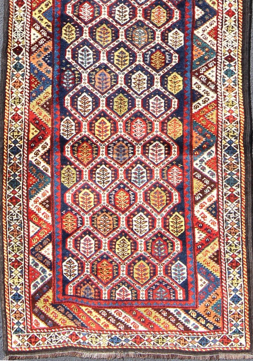 Colorful Antique Persian Lori Runner with Repeating Geometric Palmette Design Lori Antique Persian Runner in Multi - Colors with All - Over Geometric Leaf Design, rug ema - 7576, country of origin / type: Iran / Mahal, circa 1900 This antique P... - Keivan Woven ArtsEMA - 7576 - 9858Rug