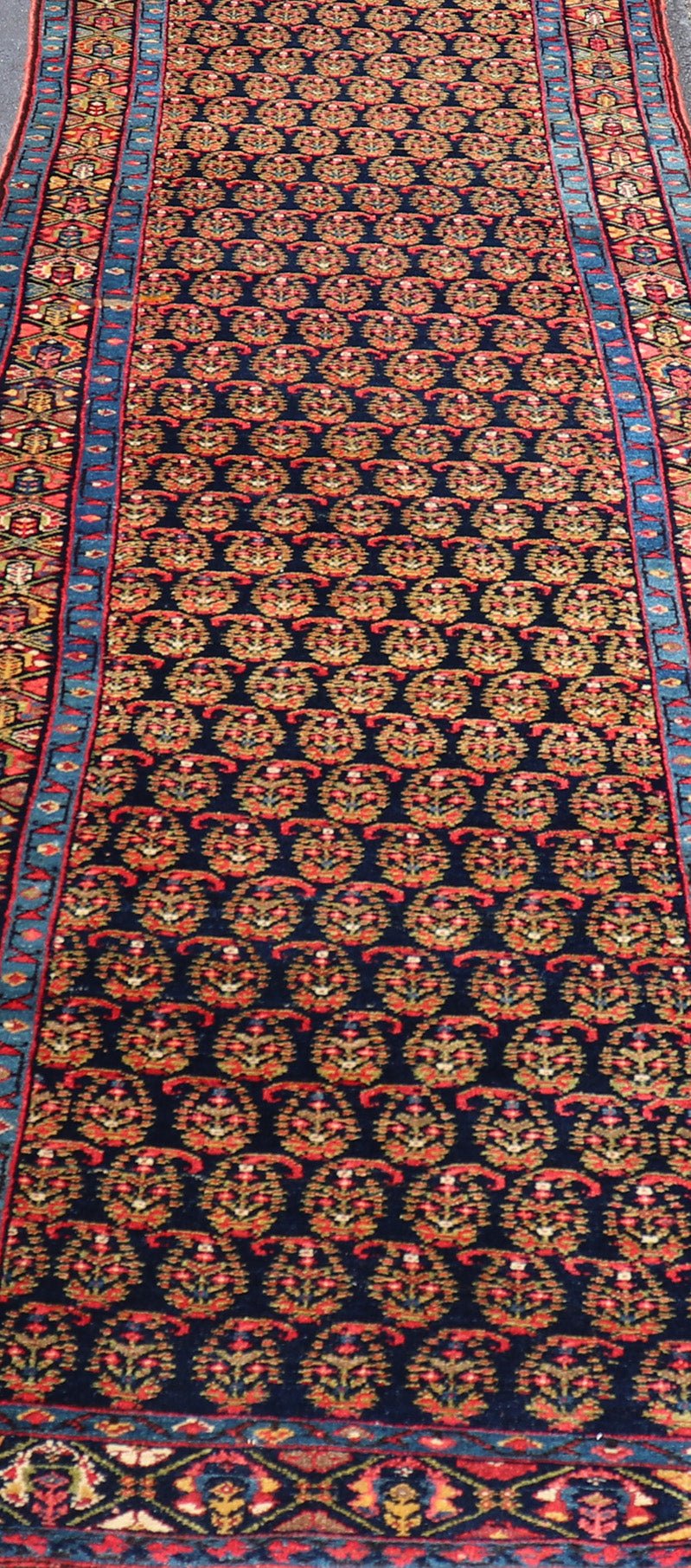 Antique Persian Malayer Paisley Design Runner in Red, Orange, and Blue Measures 3'7 x 18'7 This antique Persian Malayer features a denim blue guard for the small banded border, decorated with modest motifs in varying shades of blue, gree... - Keivan Woven ArtsEMA - 7585 - 10018Rug