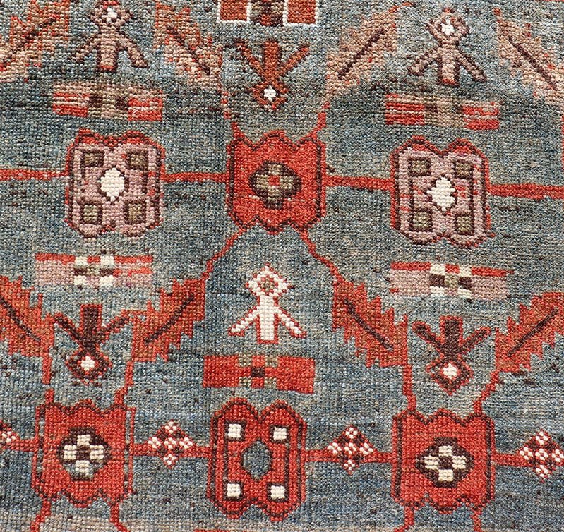 Measures: 3'6 x 13'1 This early 20th century antique Kurdish runner features a all - over tribal motifs with blue, gray, teal, and soft orange red. Kurdish Antique Runner in Vibrant Blue - Teal Background and Multi - Tiered Border. Keivan Woven Arts; rug... - Keivan Woven ArtsEMB - 22131 - 15018 - 20361Rug