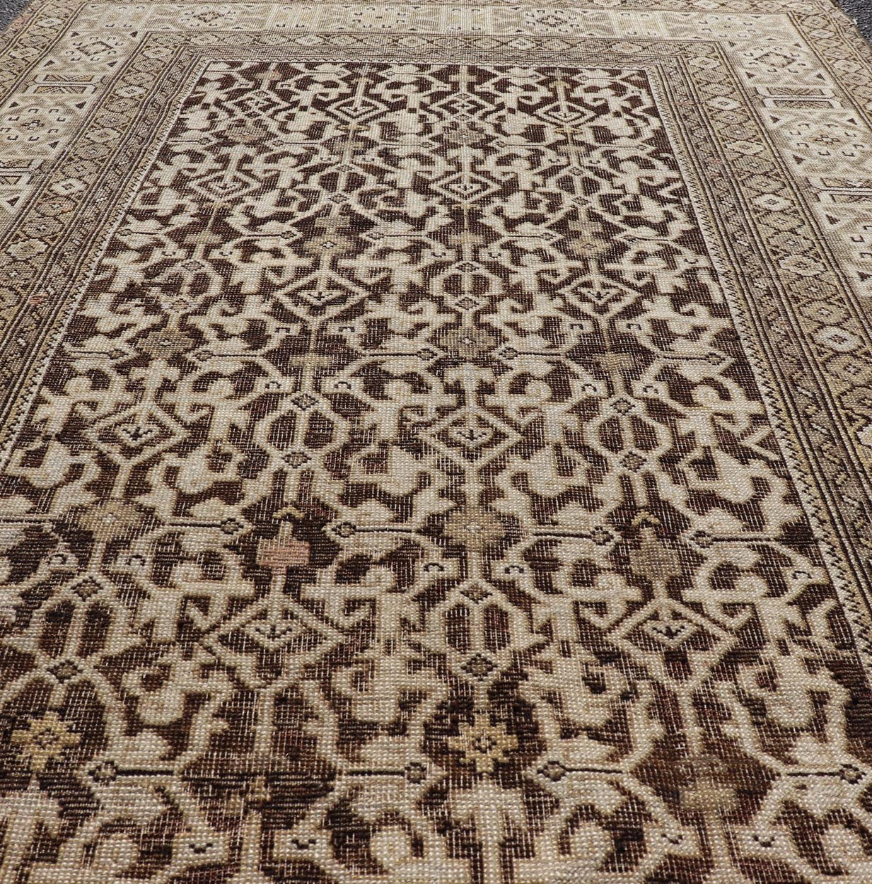 Antique Wool Hand Knotted Caucasian Kazak Rug in Dark Brown Background. Keivan Woven Arts / rug/EMB - 22184 - 15065 Late 19th Century, Kazak rug. Measures: 3'9 x 5'8 This late 19th century antique Caucasian Kazak rug displays a superb Caucasian arab... - Keivan Woven ArtsEMB - 22184 - 15065 - 20613