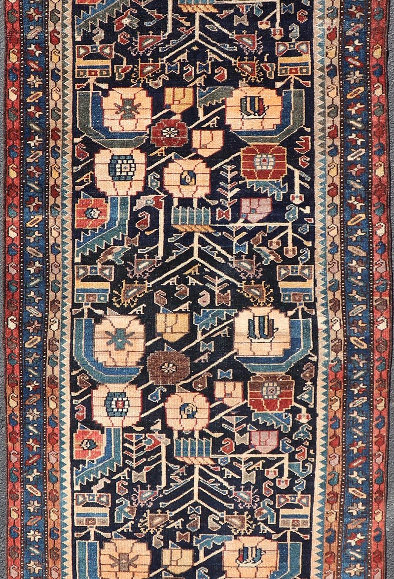 Antique Hamadan Runner in Blue Background Multi Colors With Tribal Motifs. Keivan Woven Arts / rug EMB - 22228 - 15461, country of origin / type: Iran / Hamadan, circa 1920Measures: 3'3 x 9'3 - Keivan Woven ArtsEMB - 22228 - 15461 - 21579Rug