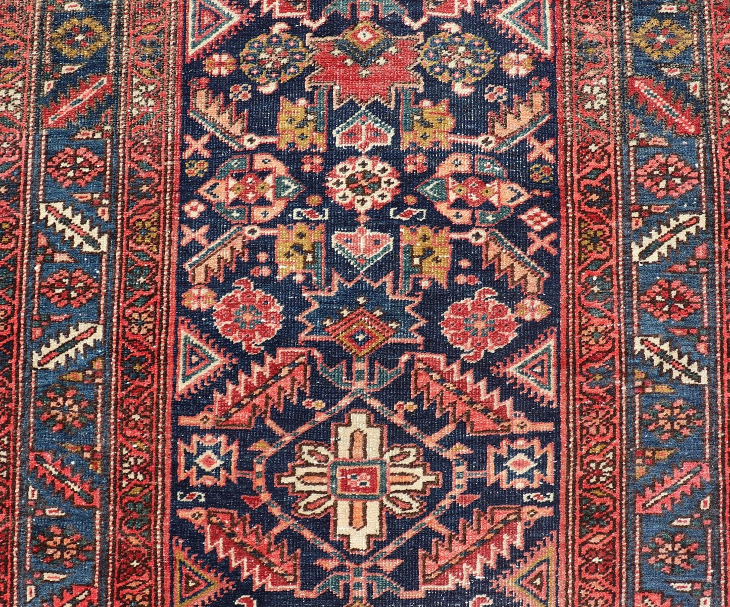 Measures: 3'9 x 11'3 This stunning Serapi runner, an exceptional example of Persian weaving, displays a vibrant and intricate design characteristic of the Serapi style known for its sophistication and complexity. The rug features a rich, dark blue ... - Keivan Woven ArtsEMB - 22258 - 22568