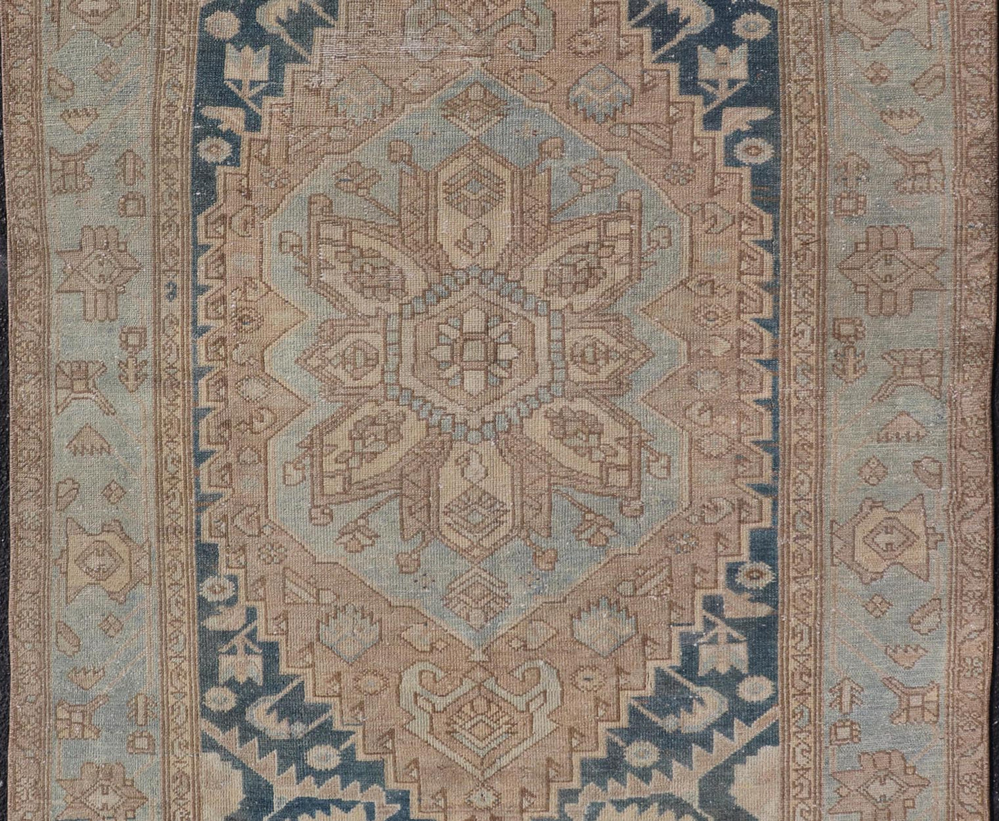 Measures: 4'2 x 6'4 This antique Persian Hamadan rug exemplifies traditional craftsmanship with its bold geometric designs and a harmonious color palette. The rug features a stunning central medallion, highlighted by its intricate detailing and sha... - Keivan Woven ArtsEMB - 22280 - 26190