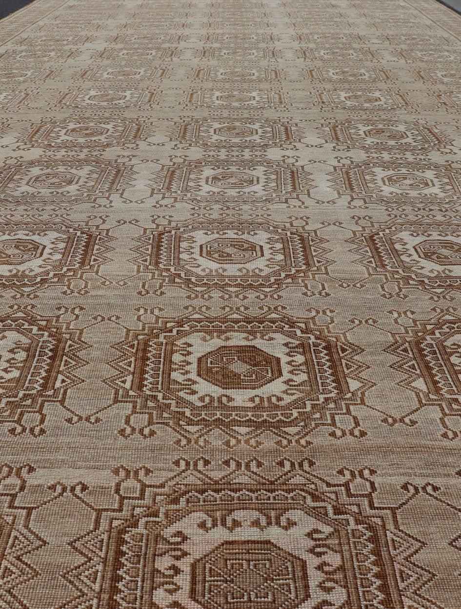 Vintage Hand - Knotted Turkman Rug with Repeating Sub - Geometric Octagonal Design This vintage hand - knotted Turkman rug features an all - over repeating sub - geometric octagonal design, rendered in ivory and earthy tones; making this rug a perfect fi... - Keivan Woven ArtsEMB - 8517 - 178547 - 13756Rug