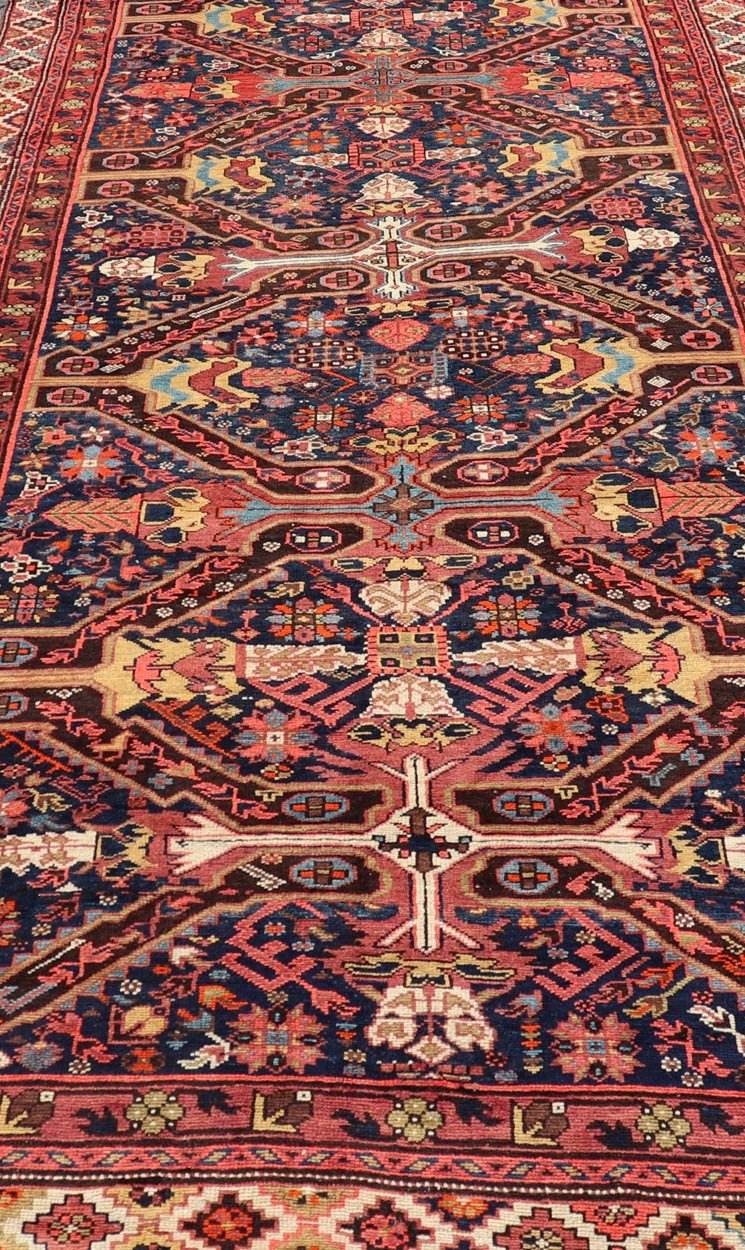Colorful Antique Seychour Large Gallery Runner with Multi - Geometric Medallions Measures: 5'10 x 12'10 Seychour rugs are known for their heavily tribal designs. This fine piece in particular holds vibrant colors and bold contrasts. The mi... - Keivan Woven ArtsEMB - 9508 - P13522 - 14614Rug
