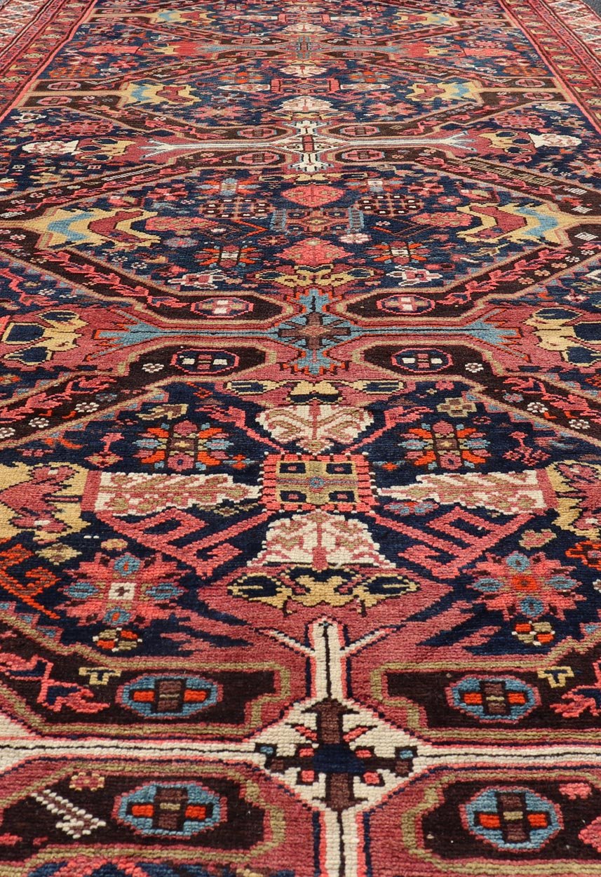 Colorful Antique Seychour Large Gallery Runner with Multi - Geometric Medallions Measures: 5'10 x 12'10 Seychour rugs are known for their heavily tribal designs. This fine piece in particular holds vibrant colors and bold contrasts. The mi... - Keivan Woven ArtsEMB - 9508 - P13522 - 14614Rug