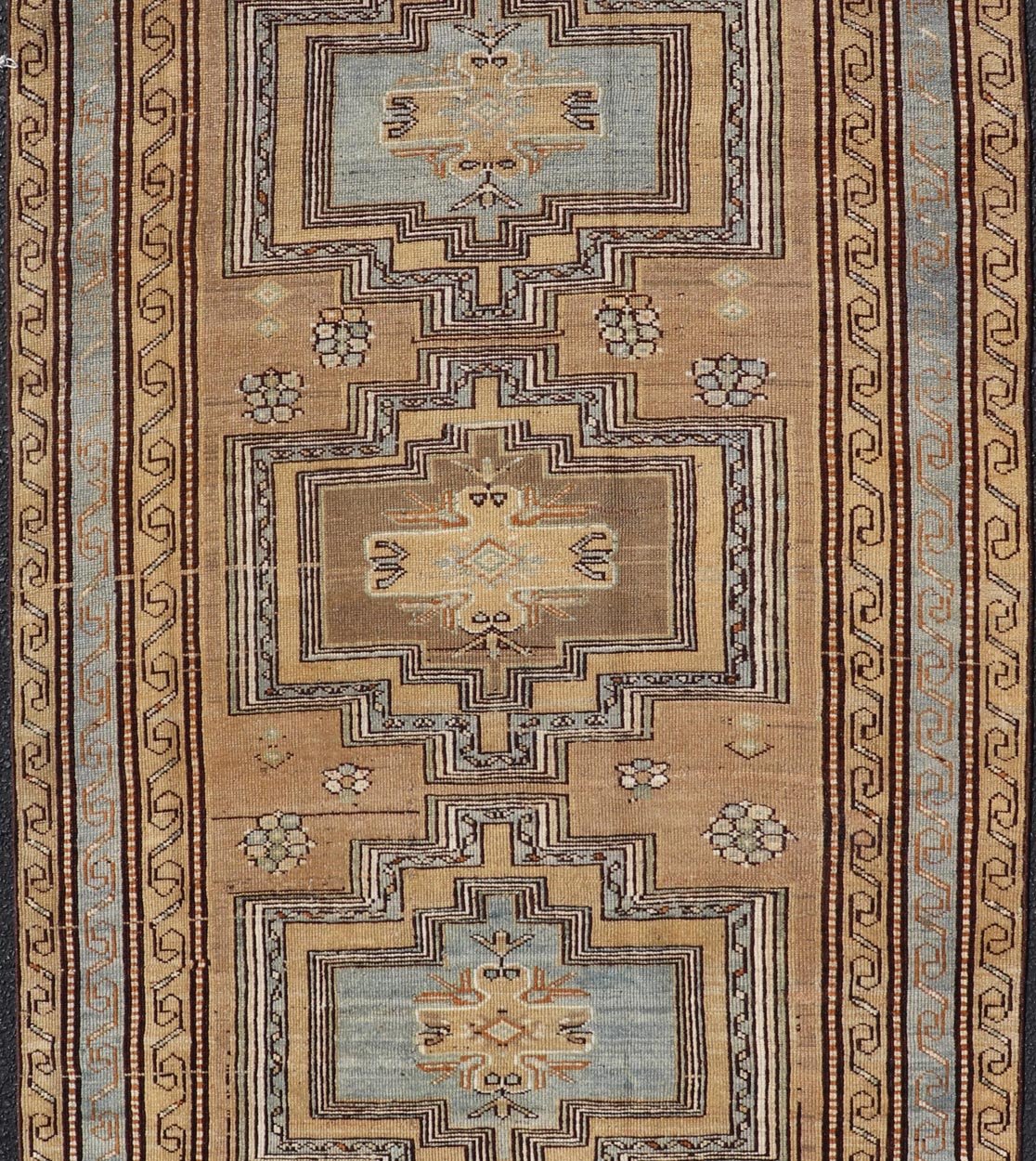 Antique Persian Kurdish Rug in Wool with Tri - Medallion Design in Brown and Blue This antique Persian Tabriz rug has been hand - knotted in wool and features a large tri - medallion design rendered in blue - gray and earthy tones. A complementary, mul... - Keivan Woven ArtsEMB - 9529 - P13069 - 14692