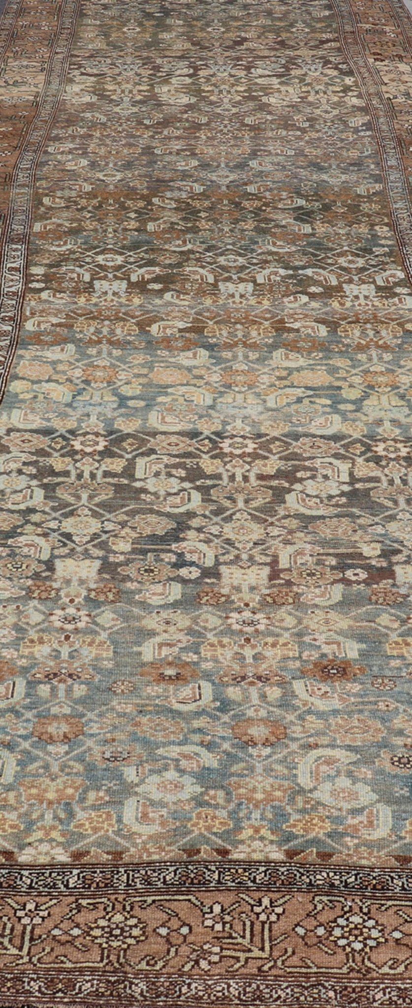 Late 19th Century Kurdish Antique All Over Design Gallery Runner in Muted Tones This magnificent 120 - year - old Kurdish antique has held timeless charm with a double - lined floral border that accentuates sandy shades of browns and light blues. The... - Keivan Woven ArtsEMB - 9566 - P13890 - 14928Rug