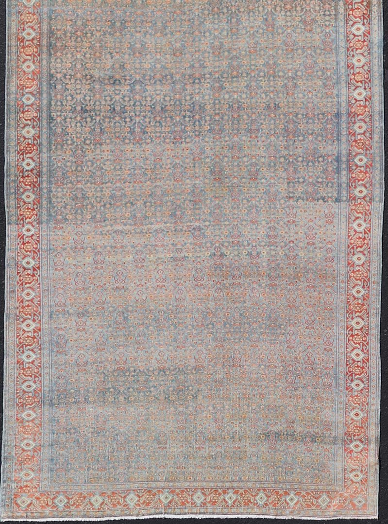 Hand - Knotted Antique Persian Long Gallery Senneh in Wool with All - Over Design This antique Persian long gallery Senneh rug has been hand - knotted in wool. The rug features an all - over sub - geometric design, set upon a blue background. The rug has ... - Keivan Woven ArtsEMB - 9582 - P13876 - 15158Rug