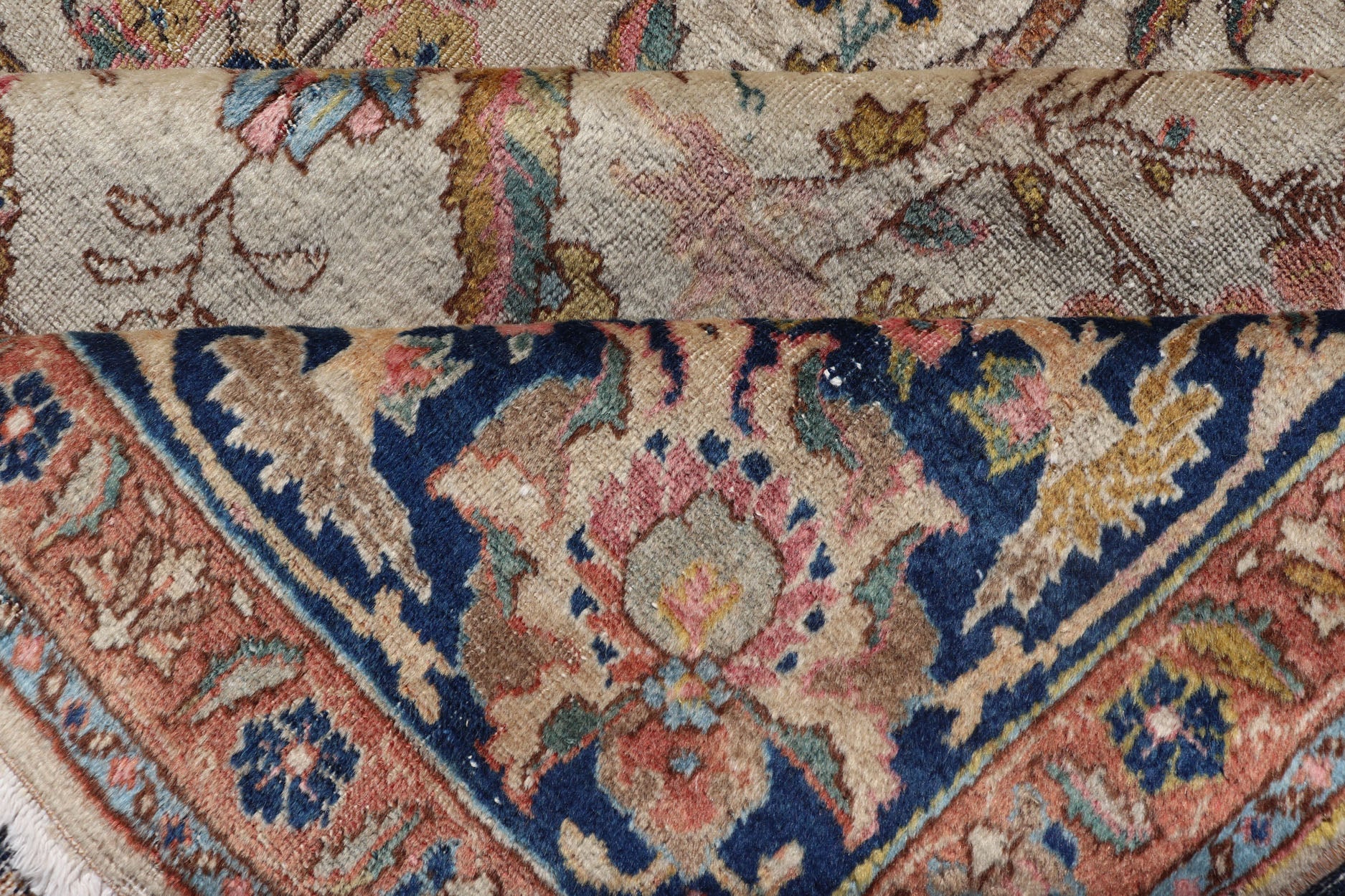 Antique Tabriz with All - Over Floral Sub - Geometric Design & Complementary Border This stunning Antique Tabriz rug (circa 1920s) features a lovely all - over floral design rendered in gold, coral, shades of blue, and pink set upon an Ivory backgroun... - Keivan Woven ArtsEMB - 9593 - P13518 - 15607Rug