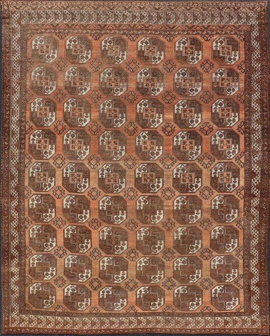 Measures:9'7 x 12'10 Antique Turkomen Ersari Rug in Wool with Repeating Gul Design in Orange, Brown. Keivan Woven Arts; rug EMB - 9594 - 13519, country of origin / type: Turkestan / Ersari, circa 1930s. This Ersari rug has been hand - knotted in th... - Keivan Woven ArtsEMB - 9594 - 13519 - 15613Rug