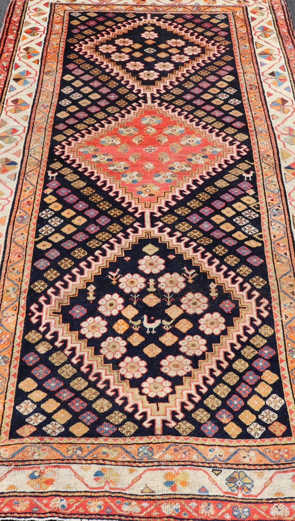 Antique Persian Tribal Shiraz in Wool with Tribal Medallion Design This antique Persian Shiraz rug has been hand - knotted in wool and features a sub - geometric tribal medallion design rendered in multicolor tones. A complementary, multi - tiered bor... - Keivan Woven ArtsEMB - 9610 - P13893 - 15929Rug