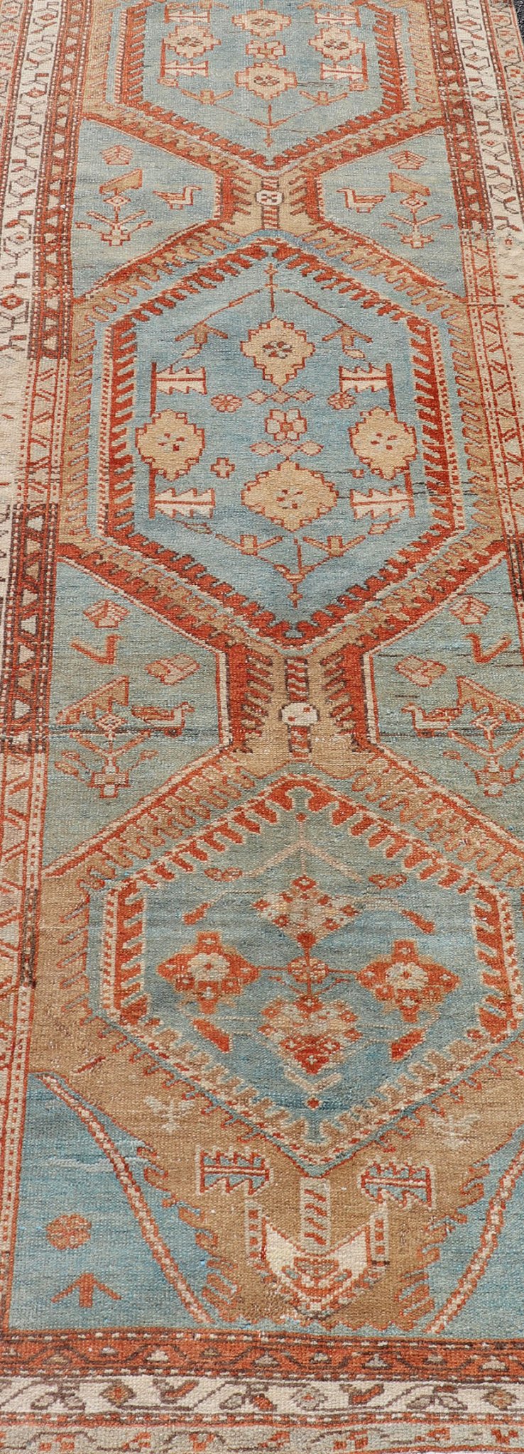 Hand - Knotted Antique Persian Karajeh Runner with Sub - Geometric Tribal Medallions This antique Persian Karajeh runner features a tribal sub - geometric triple medallion design rendered in multicolor, set upon a blue background. A complementary, mu... - Keivan Woven ArtsEMB - 9625 - P13570 - 15989Rug