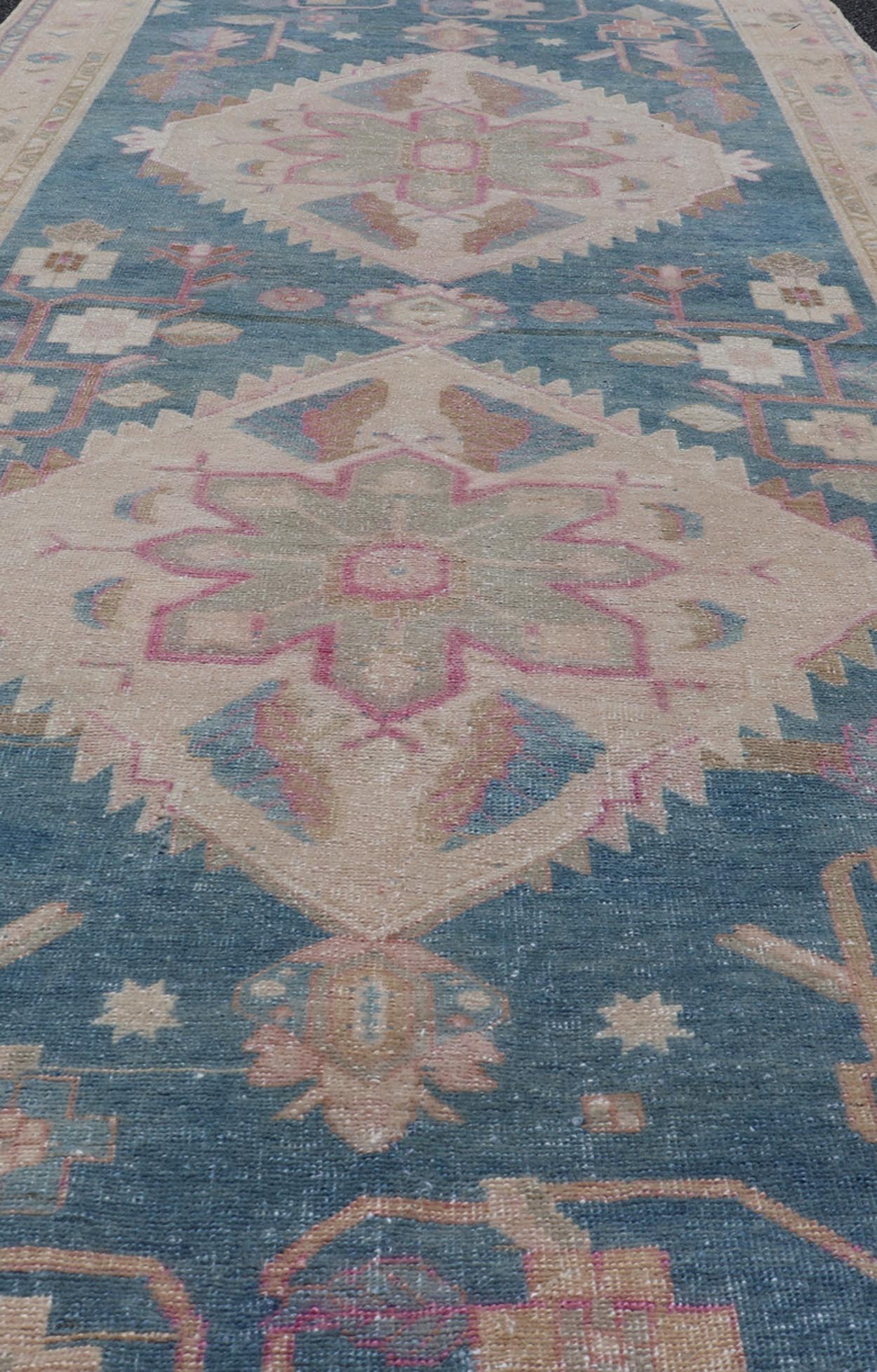Antique Persian Gallery Mahal Rug in Wool with Floral Medallion Design This antique Persian gallery Mahal rug has been hand - knotted in wool and features an all - over sub - geometric floral design rendered in blue, green, pink and neutral tones. A ... - Keivan Woven ArtsEMB - 9627 - P13892 - 16001Rug