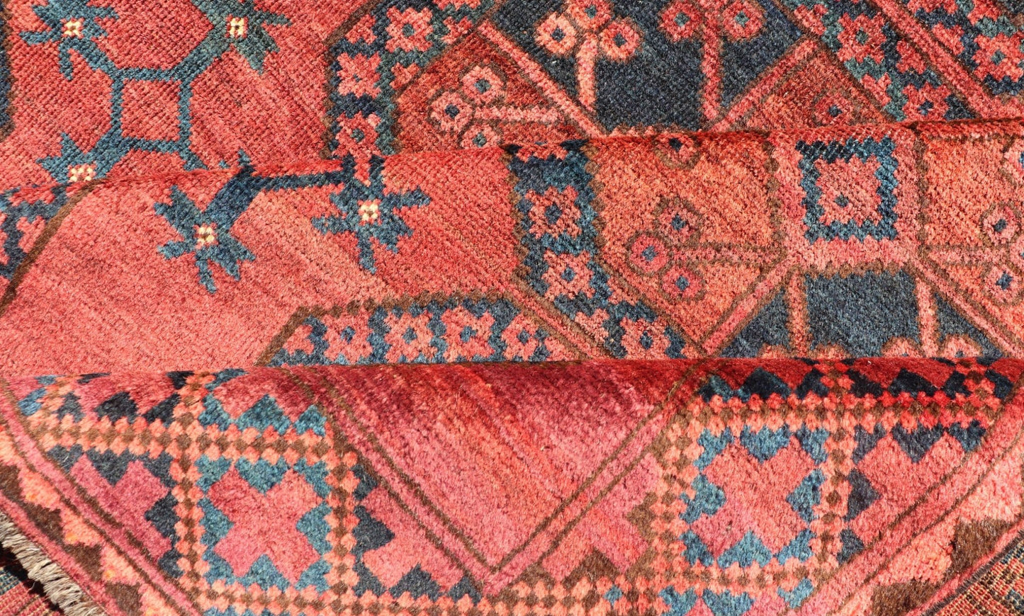 Hand - Knotted Turkomen Ersari Rug in Wool with Gul Design in Red, Orange and Blue This Turkomen Ersari rug has been hand - knotted in the finest wool. The rug features a repeating Gul design throughout the entirety of the rug, enclosed within a co... - Keivan Woven ArtsEMB - 9644 - P13547 - 16073Rug