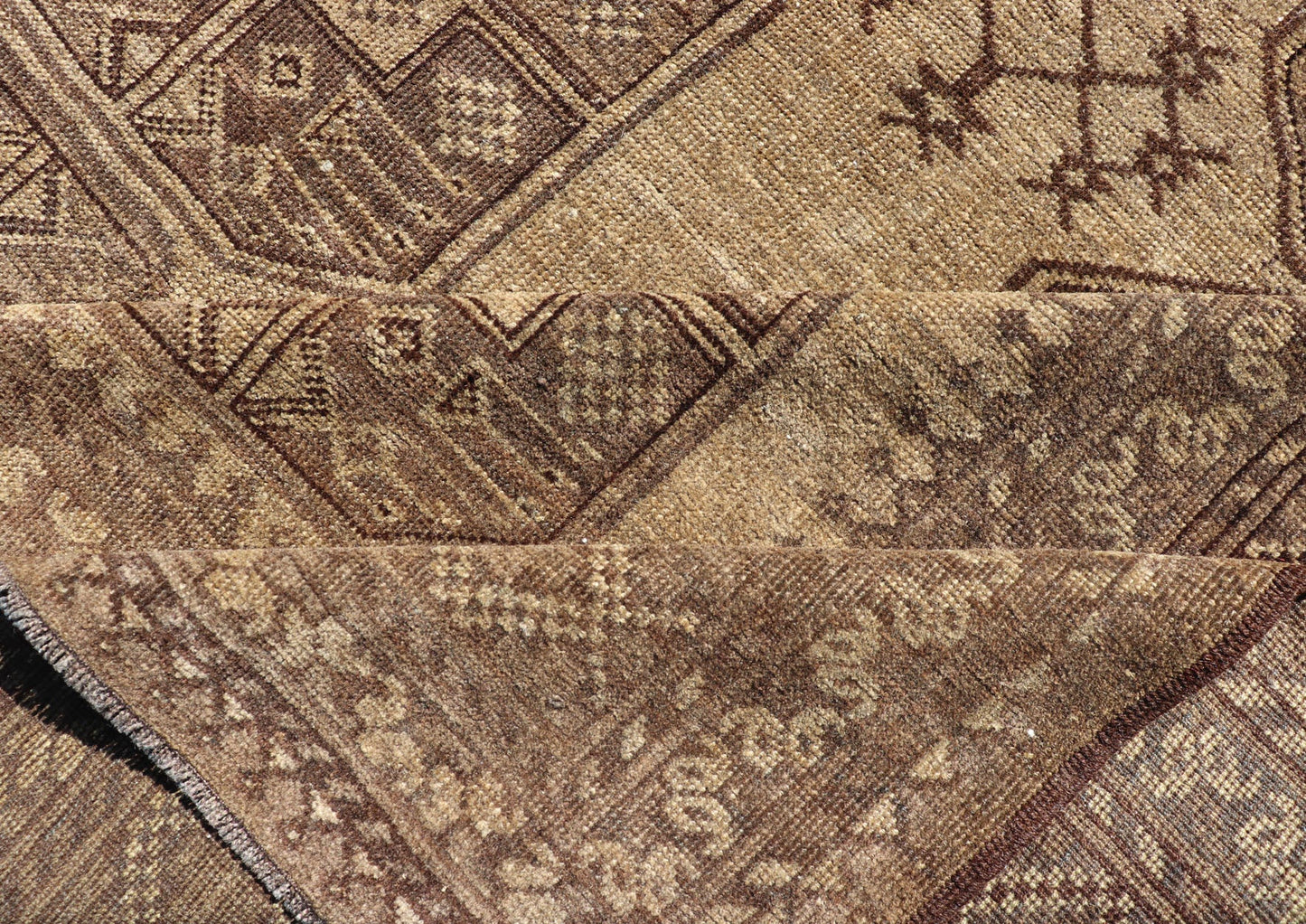 Hand - Knotted Turkomen Ersari Rug in Wool with Gul Design in Brown, Tan and Taupe This Turkomen Ersari rug has been hand - knotted in the finest wool. The rug features an all - over repeating Gul design throughout the entirety of the rug, enclosed w... - Keivan Woven ArtsEMB - 9647 - P13549 - 16091Rug