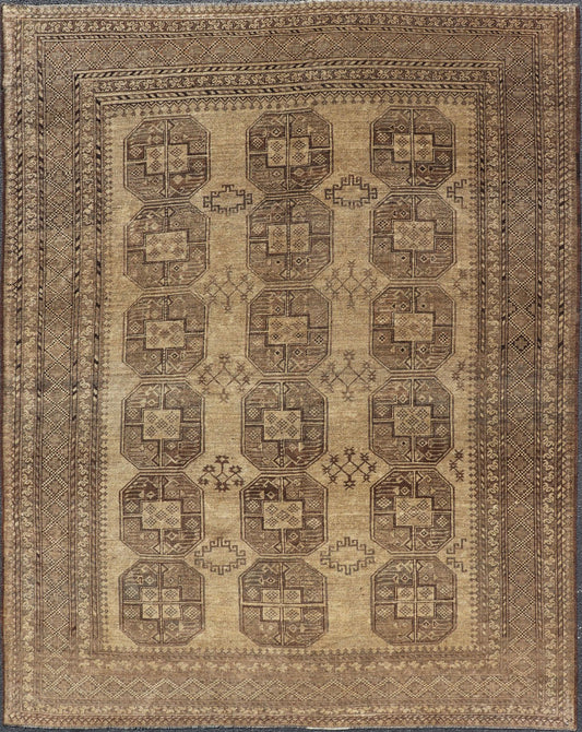 Hand - Knotted Turkomen Ersari Rug in Wool with Gul Design in Brown, Tan and Taupe This Turkomen Ersari rug has been hand - knotted in the finest wool. The rug features an all - over repeating Gul design throughout the entirety of the rug, enclosed w... - Keivan Woven ArtsEMB - 9647 - P13549 - 16091Rug
