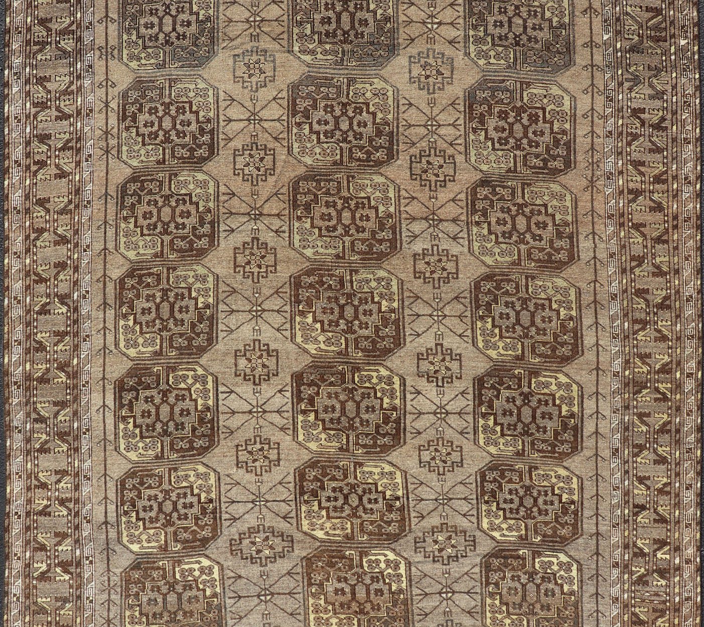 Hand - Knotted Turkomen Ersari Rug in Wool with Repeating Sub - Geometric Gul Design This Turkomen Ersari rug has been hand - knotted in the finest wool. The rug features a repeating Gul design throughout the entirety of the rug, enclosed within a co... - Keivan Woven ArtsEMB - 9649 - P13543 - 16103Rug