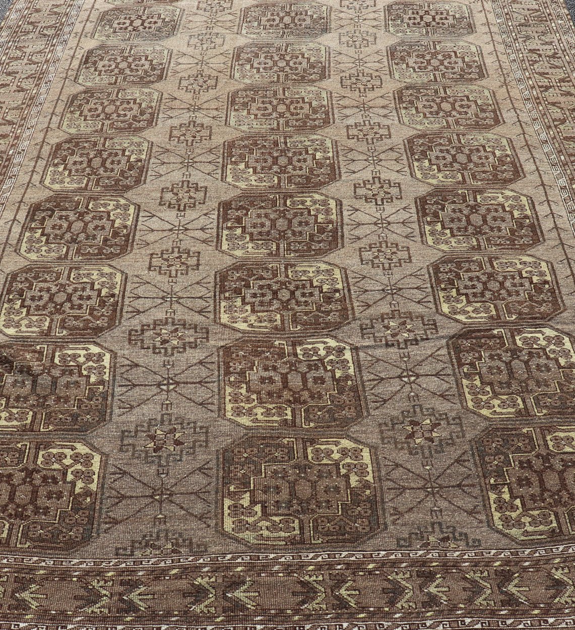 Hand - Knotted Turkomen Ersari Rug in Wool with Repeating Sub - Geometric Gul Design This Turkomen Ersari rug has been hand - knotted in the finest wool. The rug features a repeating Gul design throughout the entirety of the rug, enclosed within a co... - Keivan Woven ArtsEMB - 9649 - P13543 - 16103Rug