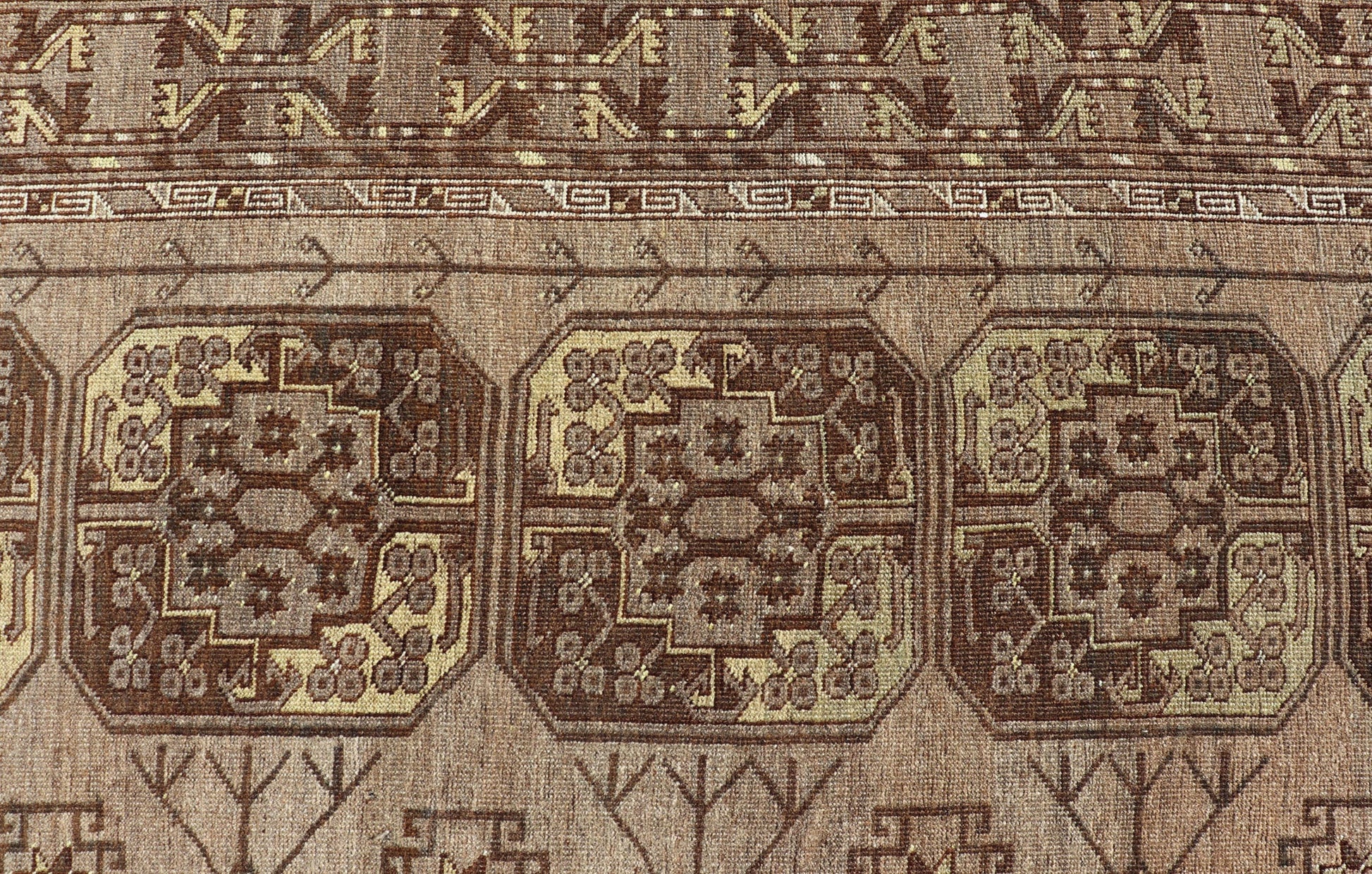 Hand - Knotted Turkomen Ersari Rug in Wool with Repeating Sub - Geometric Gul Design This Turkomen Ersari rug has been hand - knotted in the finest wool. The rug features a repeating Gul design throughout the entirety of the rug, enclosed within a co... - Keivan Woven ArtsEMB - 9649 - P13543 - 16103Rug