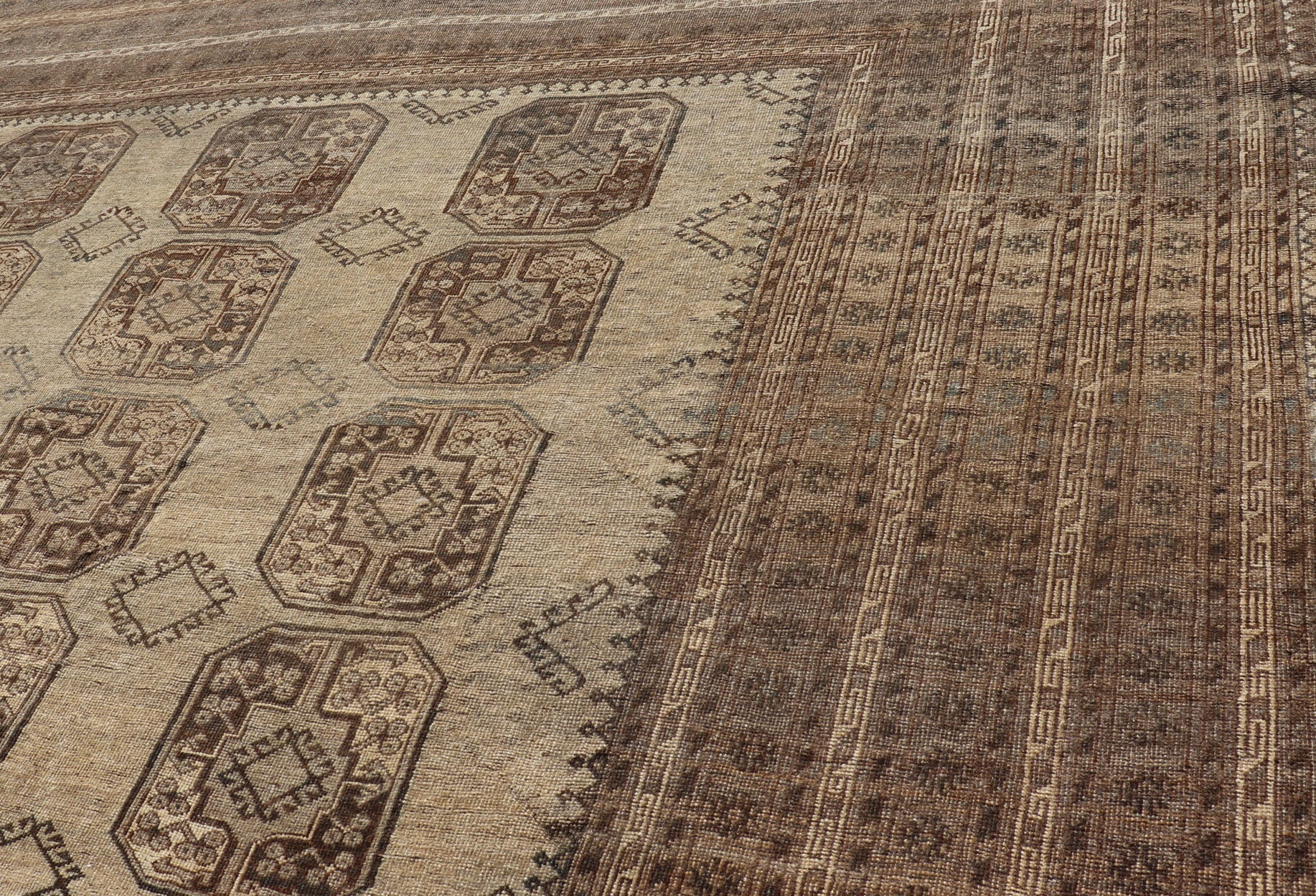 Square Sized Hand - Knotted Turkomen Ersari Rug in Wool with Repeating Gul Design This square sized Ersari rug has been hand - knotted in the finest wool. The rug features an all - over sub - geometric repeating Gul design throughout the entirety of th... - Keivan Woven ArtsEMB - 9651 - P13595 - 16115Rug