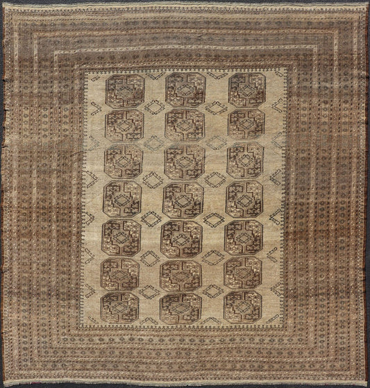Square Sized Hand - Knotted Turkomen Ersari Rug in Wool with Repeating Gul Design This square sized Ersari rug has been hand - knotted in the finest wool. The rug features an all - over sub - geometric repeating Gul design throughout the entirety of th... - Keivan Woven ArtsEMB - 9651 - P13595 - 16115Rug