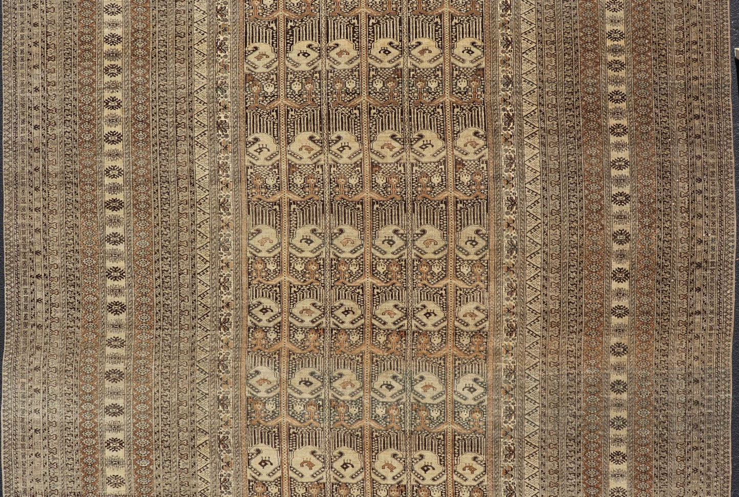 Hand - Knotted Turkomen Ersari Rug in Wool with All - Over Tribal Beluch Design This Ersari rug has been hand - knotted in the finest wool. The rug features a repeating derivative of a tribal beluch design throughout the entirety of the rug, enclose... - Keivan Woven ArtsEMB - 9655 - P13594 - 16133Rug