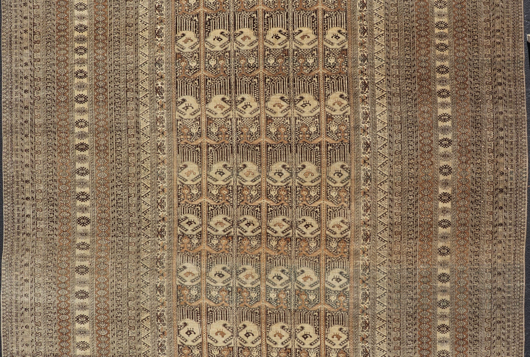 Hand - Knotted Turkomen Ersari Rug in Wool with All - Over Tribal Beluch Design This Ersari rug has been hand - knotted in the finest wool. The rug features a repeating derivative of a tribal beluch design throughout the entirety of the rug, enclose... - Keivan Woven ArtsEMB - 9655 - P13594 - 16133Rug