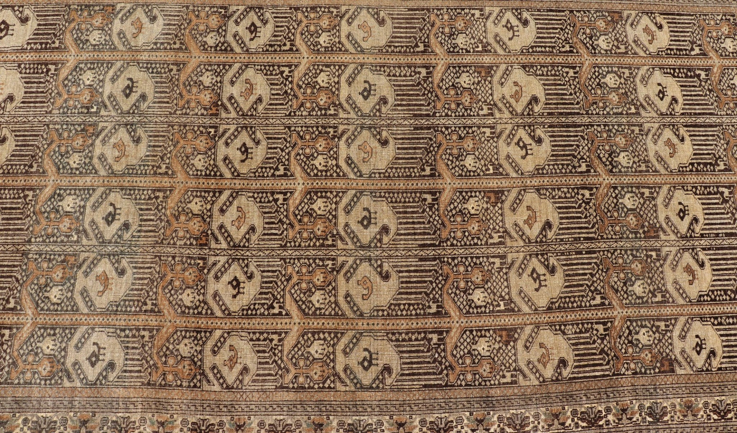 Hand - Knotted Turkomen Ersari Rug in Wool with All - Over Tribal Beluch Design This Ersari rug has been hand - knotted in the finest wool. The rug features a repeating derivative of a tribal beluch design throughout the entirety of the rug, enclose... - Keivan Woven ArtsEMB - 9655 - P13594 - 16133Rug