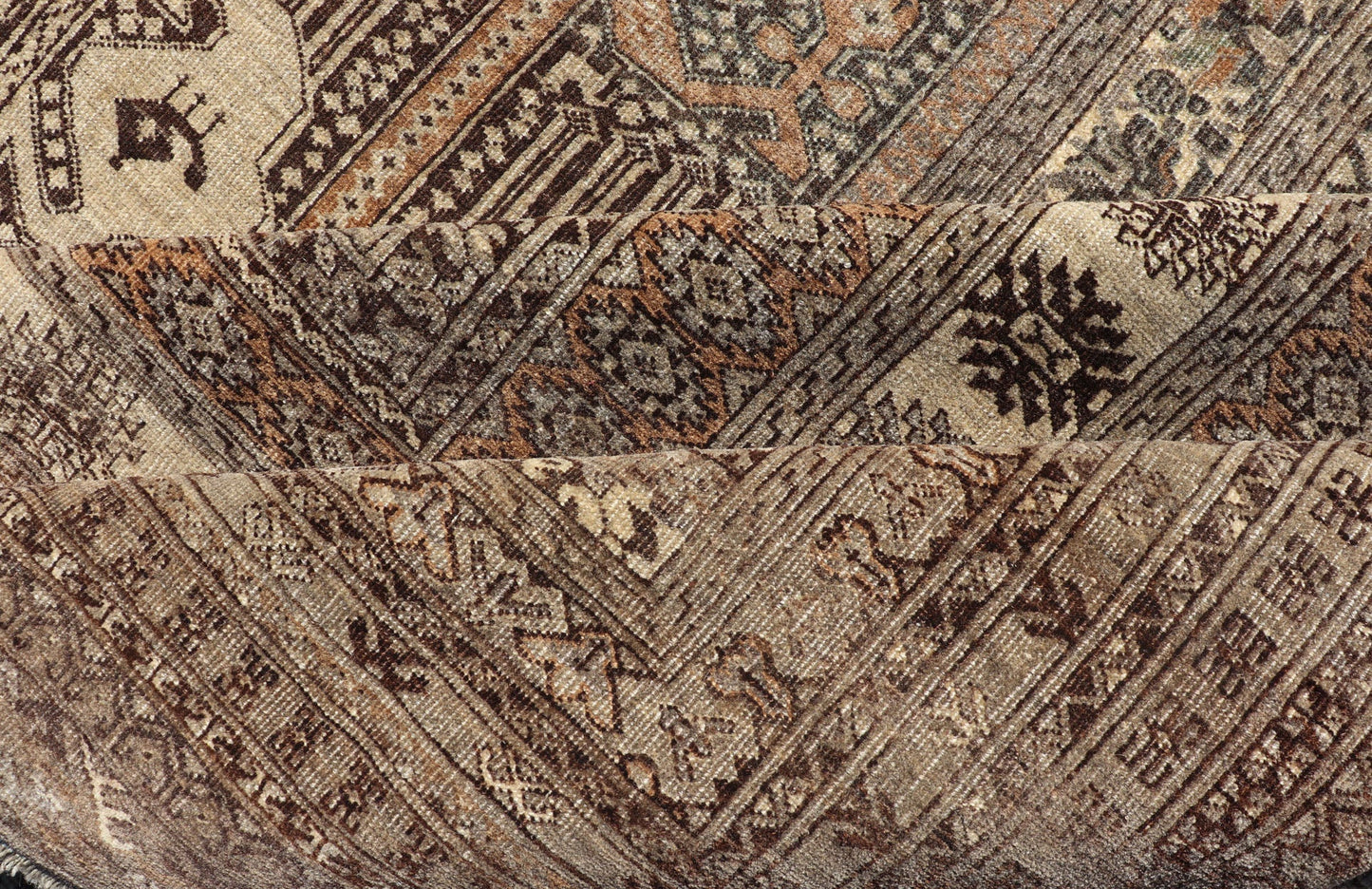 Hand - Knotted Turkomen Ersari Rug in Wool with All - Over Tribal Beluch Design This Ersari rug has been hand - knotted in the finest wool. The rug features a repeating derivative of a tribal beluch design throughout the entirety of the rug, enclose... - Keivan Woven ArtsEMB - 9655 - P13594 - 16133Rug