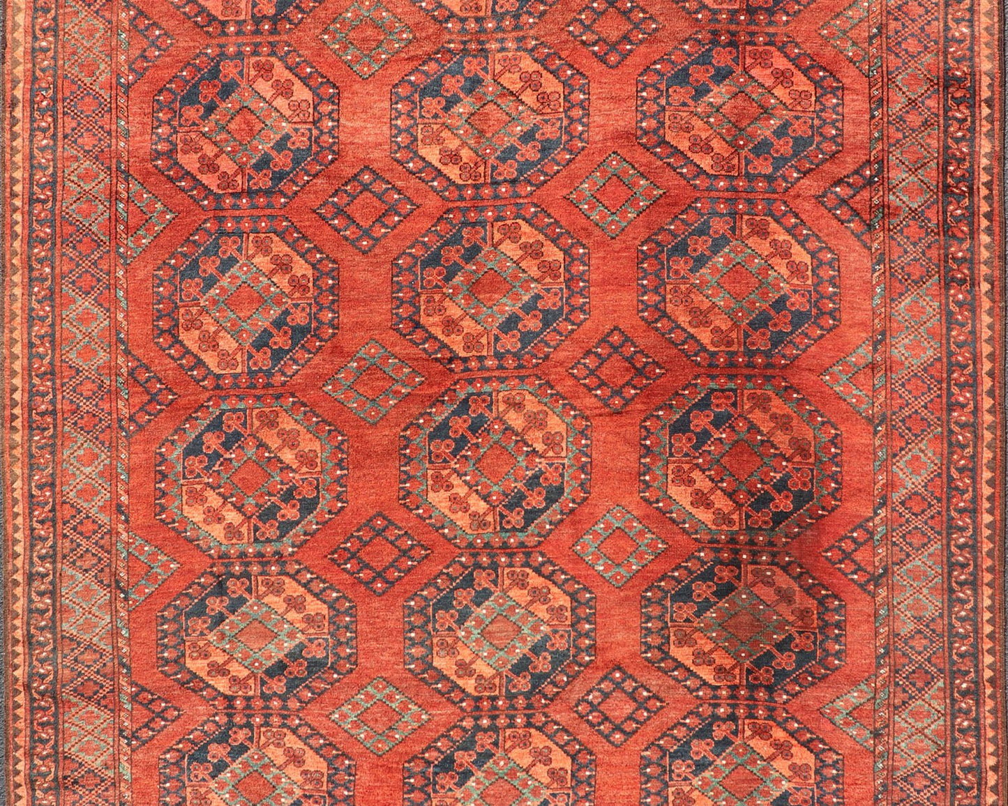 Early 20th Century Hand - Knotted Turkomen Ersari Rug in Wool with Gul Design This Ersari rug has been hand - knotted in the finest wool. The rug features a repeating Gul design throughout the entirety of the piece, enclosed within a complementary,... - Keivan Woven ArtsEMB - 9657 - P13540 - 16145Rug