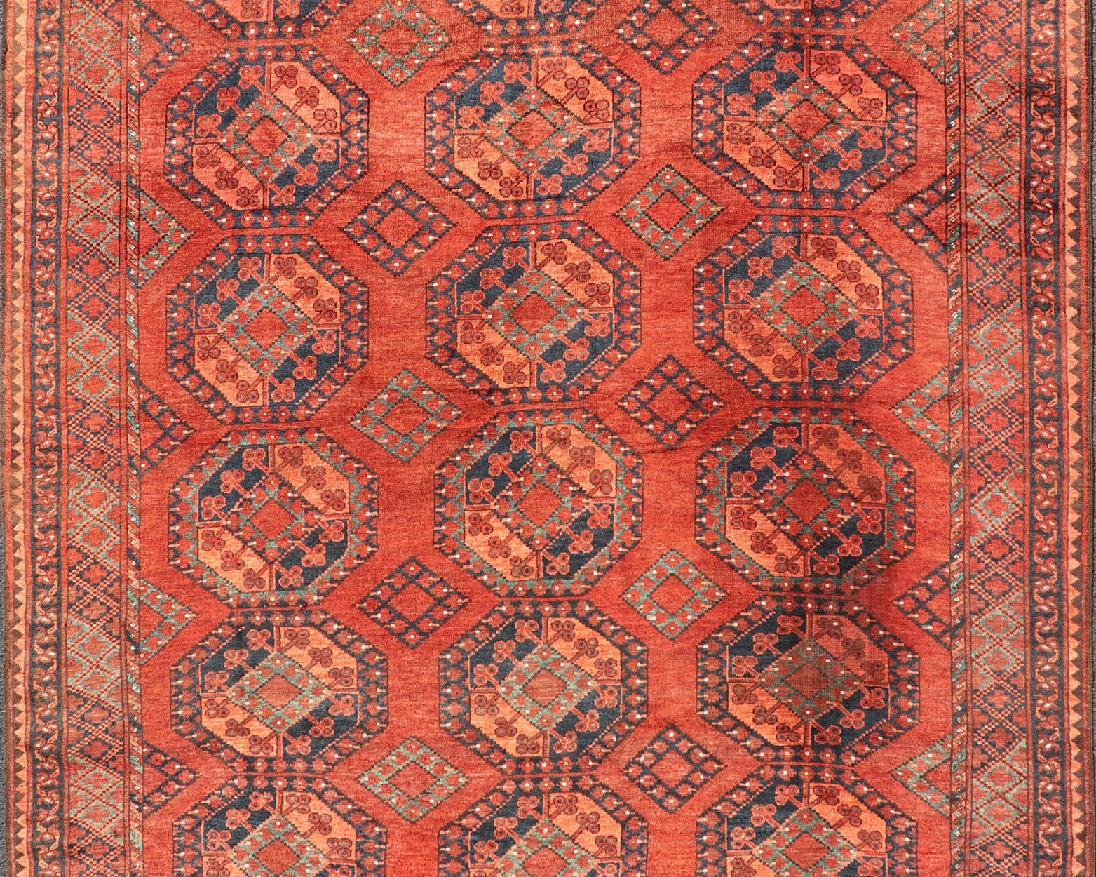 Early 20th Century Hand - Knotted Turkomen Ersari Rug in Wool with Gul Design This Ersari rug has been hand - knotted in the finest wool. The rug features a repeating Gul design throughout the entirety of the piece, enclosed within a complementary,... - Keivan Woven ArtsEMB - 9657 - P13540 - 16145Rug