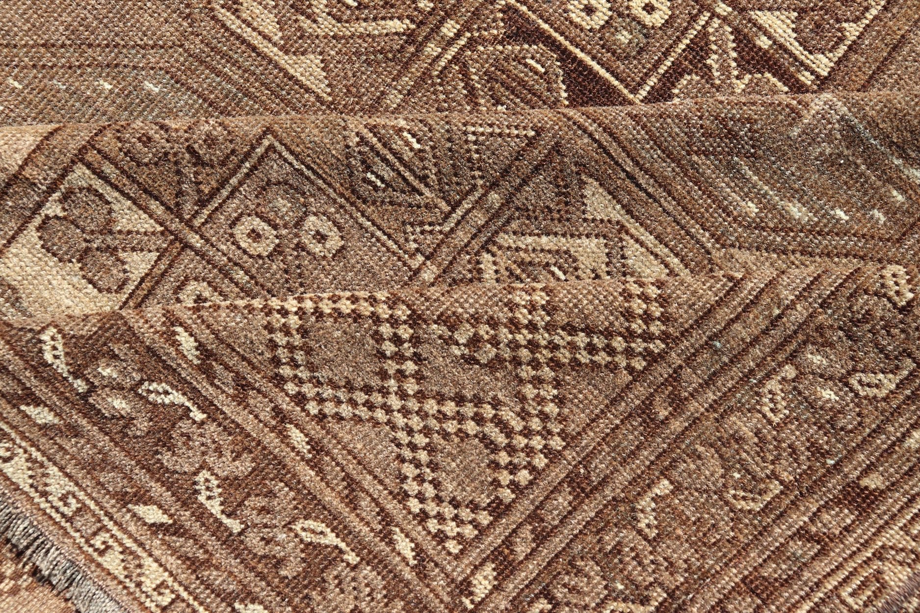 Hand - Knotted Turkomen Ersari Rug in Wool with Sub - Geometric Repeating Gul Design This Ersari rug has been hand - knotted in the finest wool. The rug features a sub - geometric repeating Gul design throughout the entirety of the rug, enclosed within... - Keivan Woven ArtsEMB - 9658 - P13539 - 16151Rug