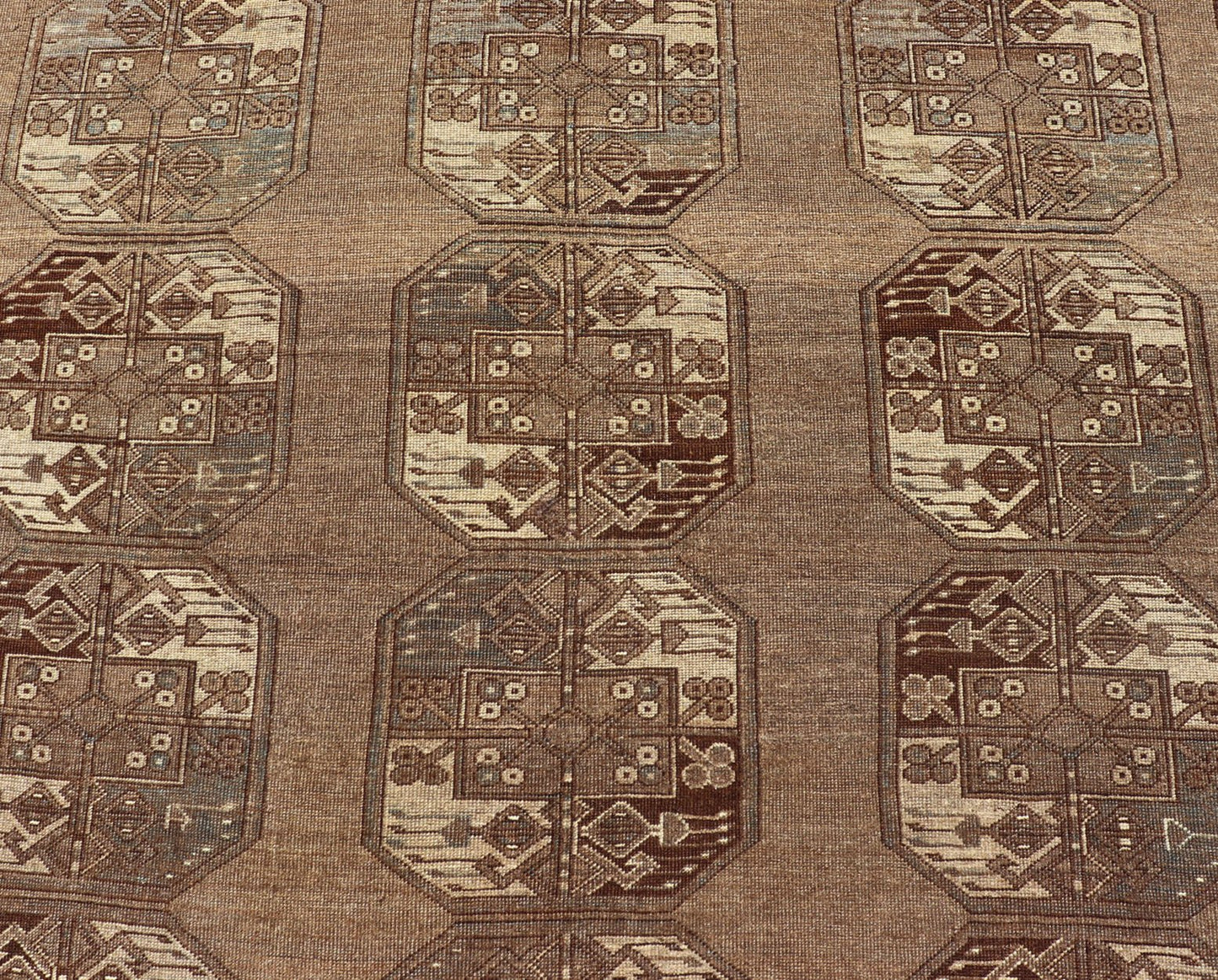 Hand - Knotted Turkomen Ersari Rug in Wool with Sub - Geometric Repeating Gul Design This Ersari rug has been hand - knotted in the finest wool. The rug features a sub - geometric repeating Gul design throughout the entirety of the rug, enclosed within... - Keivan Woven ArtsEMB - 9658 - P13539 - 16151Rug