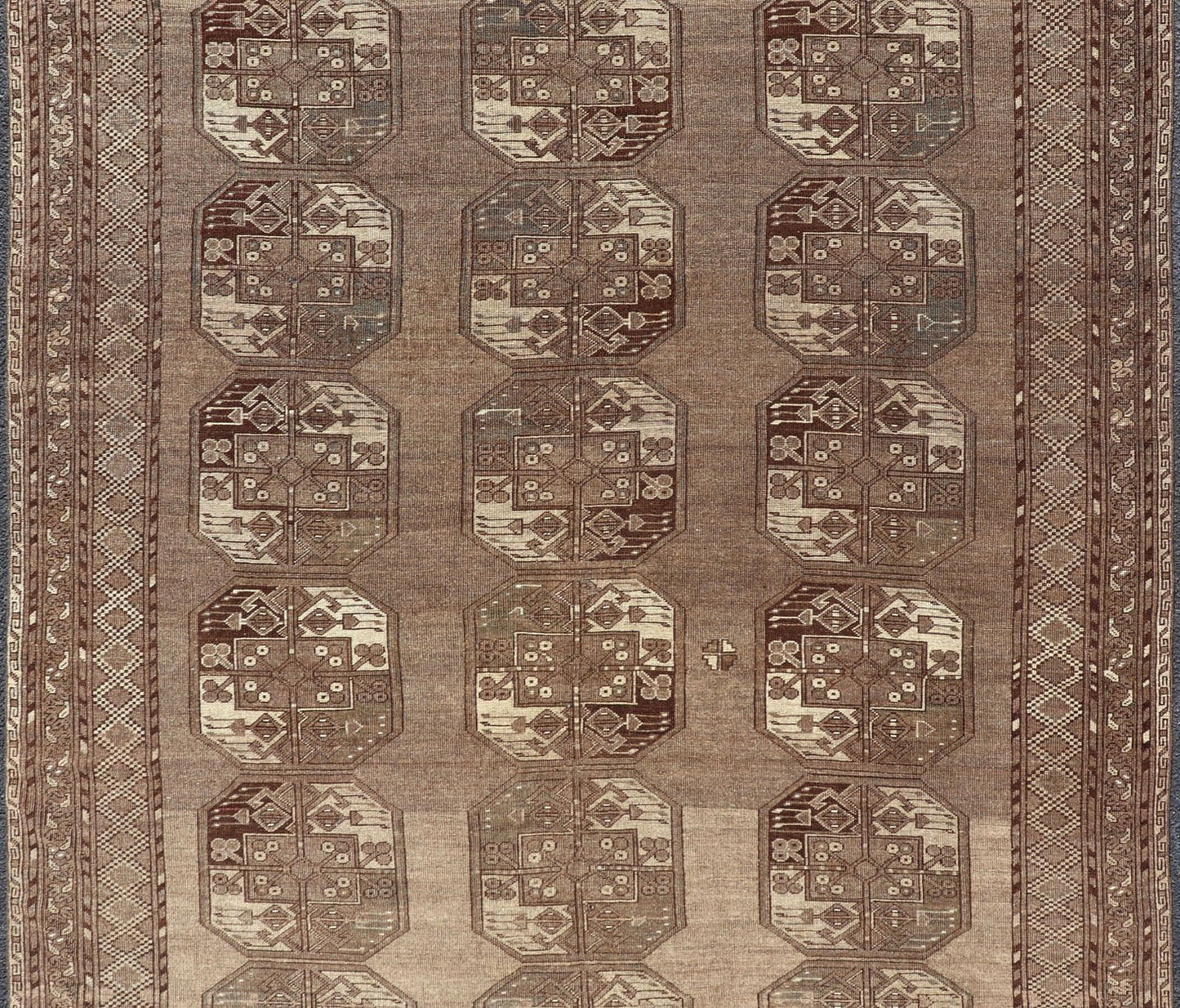 Hand - Knotted Turkomen Ersari Rug in Wool with Sub - Geometric Repeating Gul Design This Ersari rug has been hand - knotted in the finest wool. The rug features a sub - geometric repeating Gul design throughout the entirety of the rug, enclosed within... - Keivan Woven ArtsEMB - 9658 - P13539 - 16151Rug