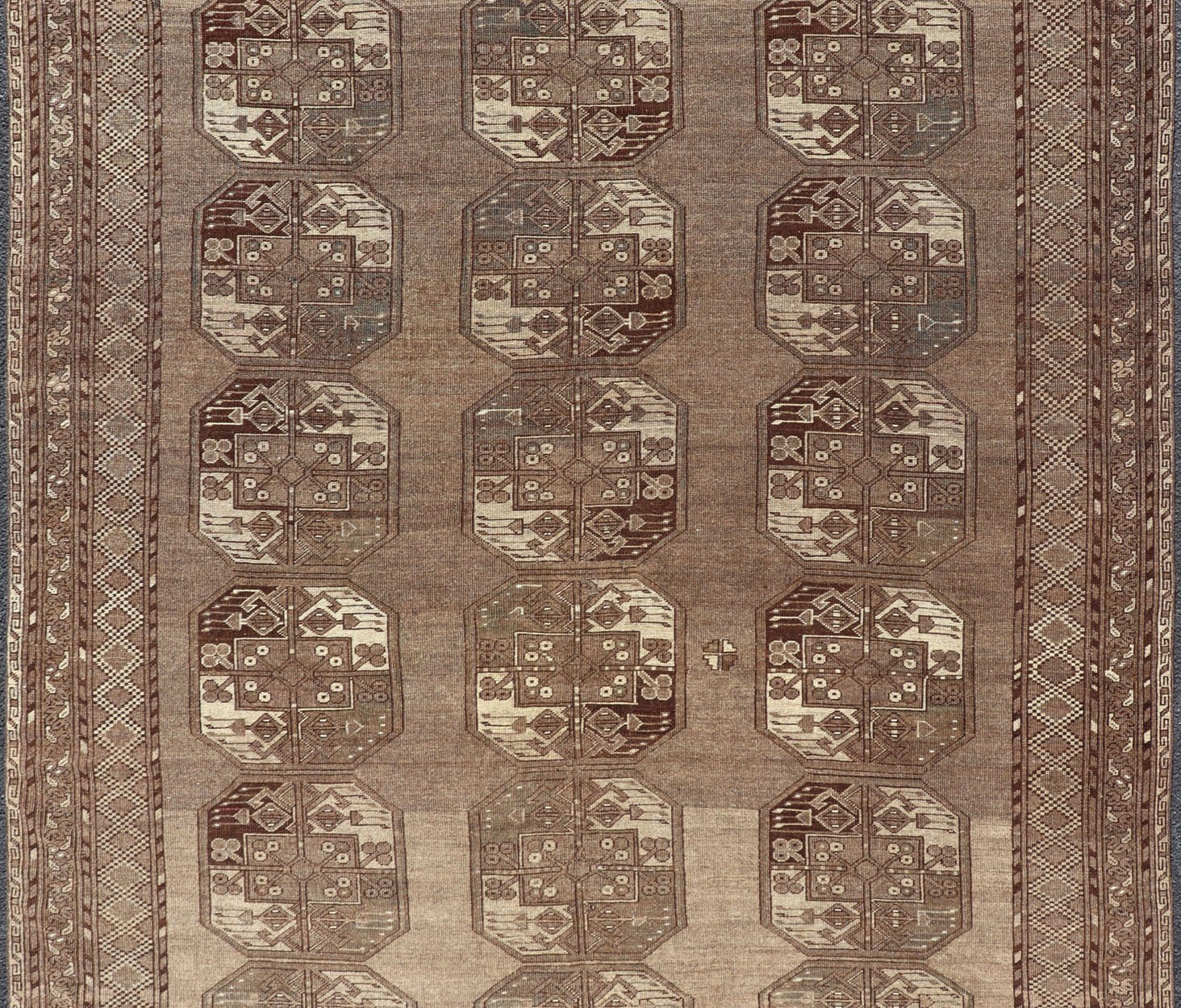 Hand - Knotted Turkomen Ersari Rug in Wool with Sub - Geometric Repeating Gul Design This Ersari rug has been hand - knotted in the finest wool. The rug features a sub - geometric repeating Gul design throughout the entirety of the rug, enclosed within... - Keivan Woven ArtsEMB - 9658 - P13539 - 16151Rug