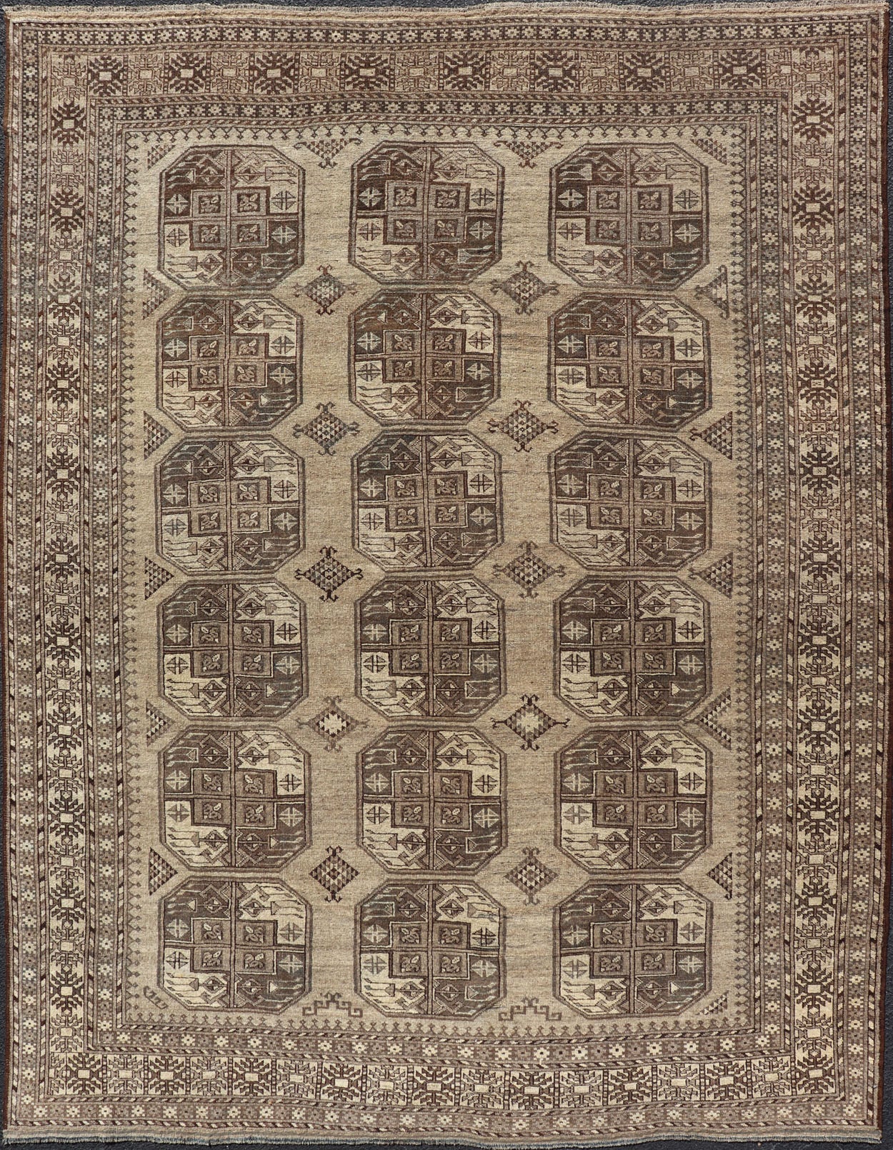 Hand - Knotted Turkomen Ersari Rug in Wool with All - Over Repeating Gul Design This Ersari rug has been hand - knotted in the finest wool. The rug features an all - over repeating Gul design throughout the entirety of the rug, enclosed within a comple... - Keivan Woven ArtsEMB - 9659 - P13591 - 16157Rug