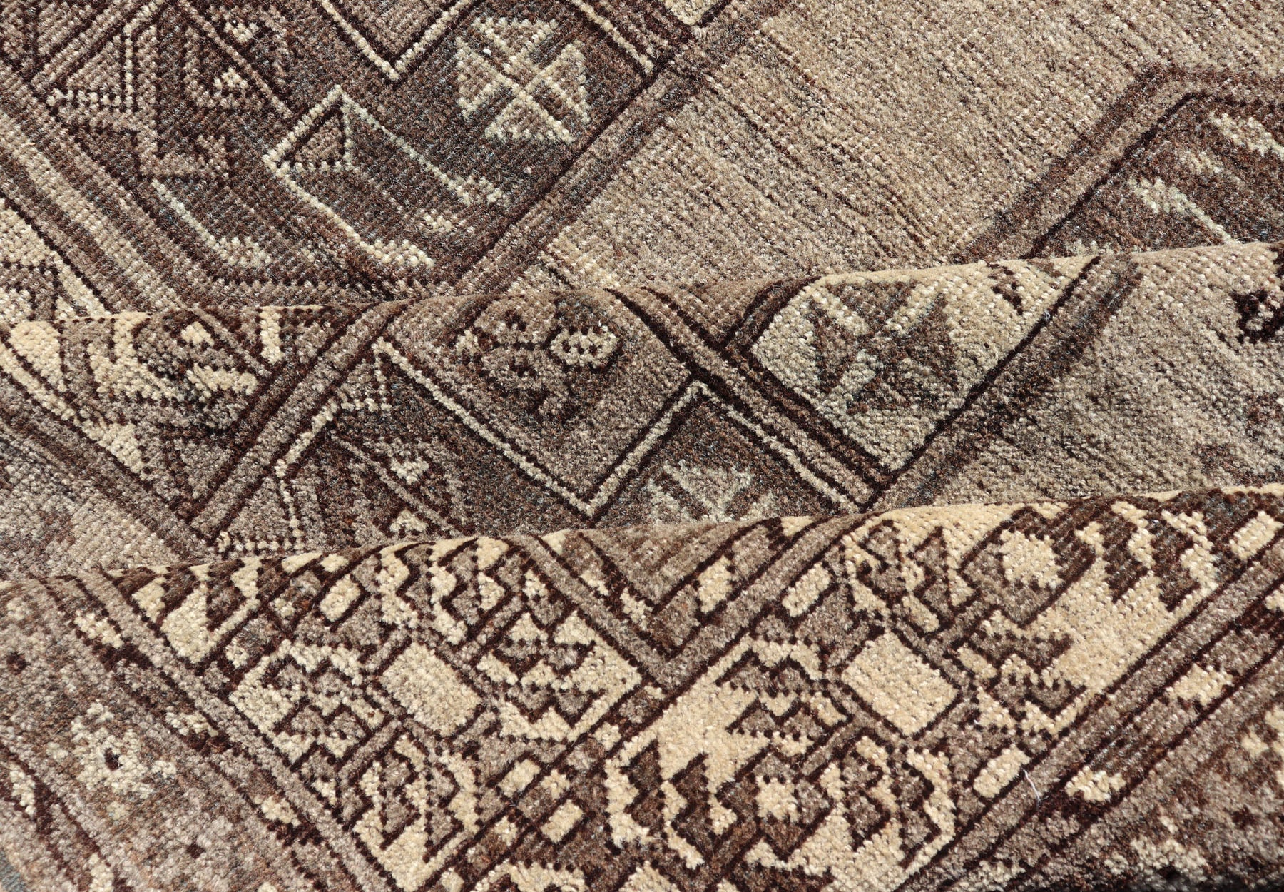 Hand - Knotted Turkomen Ersari Rug in Wool with All - Over Repeating Gul Design This Ersari rug has been hand - knotted in the finest wool. The rug features an all - over repeating Gul design throughout the entirety of the rug, enclosed within a comple... - Keivan Woven ArtsEMB - 9659 - P13591 - 16157Rug