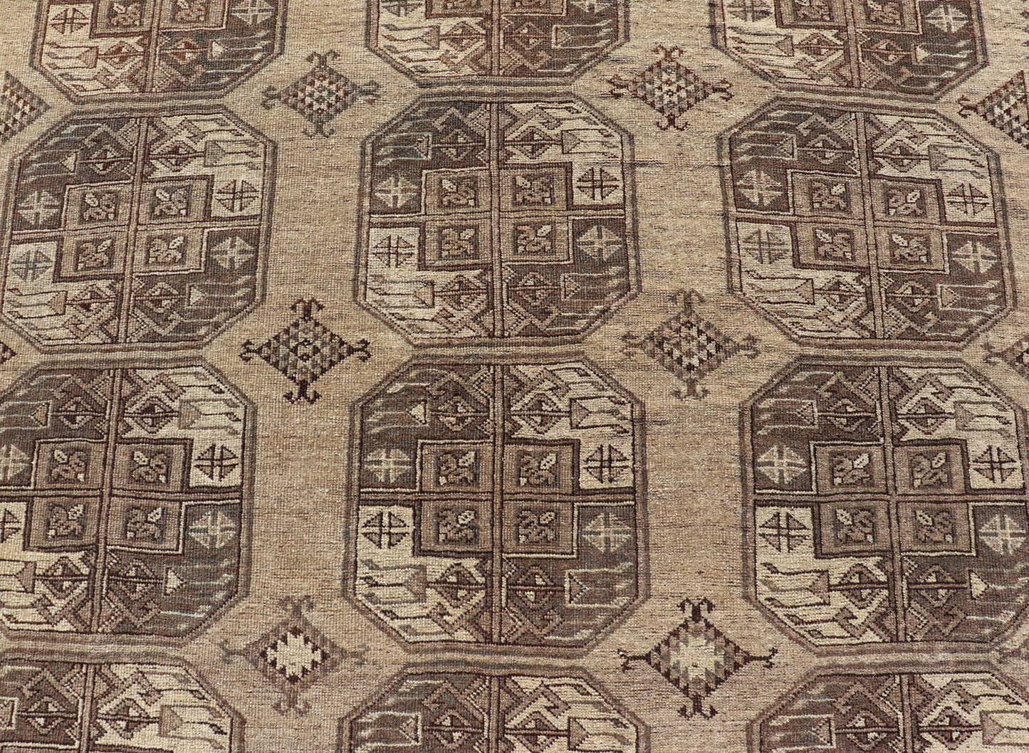 Hand - Knotted Turkomen Ersari Rug in Wool with All - Over Repeating Gul Design This Ersari rug has been hand - knotted in the finest wool. The rug features an all - over repeating Gul design throughout the entirety of the rug, enclosed within a comple... - Keivan Woven ArtsEMB - 9659 - P13591 - 16157Rug
