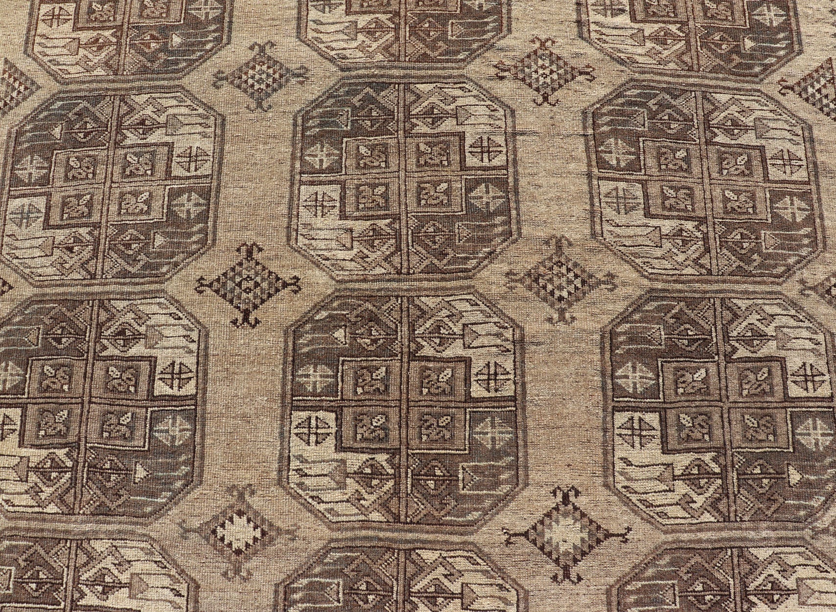 Hand - Knotted Turkomen Ersari Rug in Wool with All - Over Repeating Gul Design This Ersari rug has been hand - knotted in the finest wool. The rug features an all - over repeating Gul design throughout the entirety of the rug, enclosed within a comple... - Keivan Woven ArtsEMB - 9659 - P13591 - 16157Rug