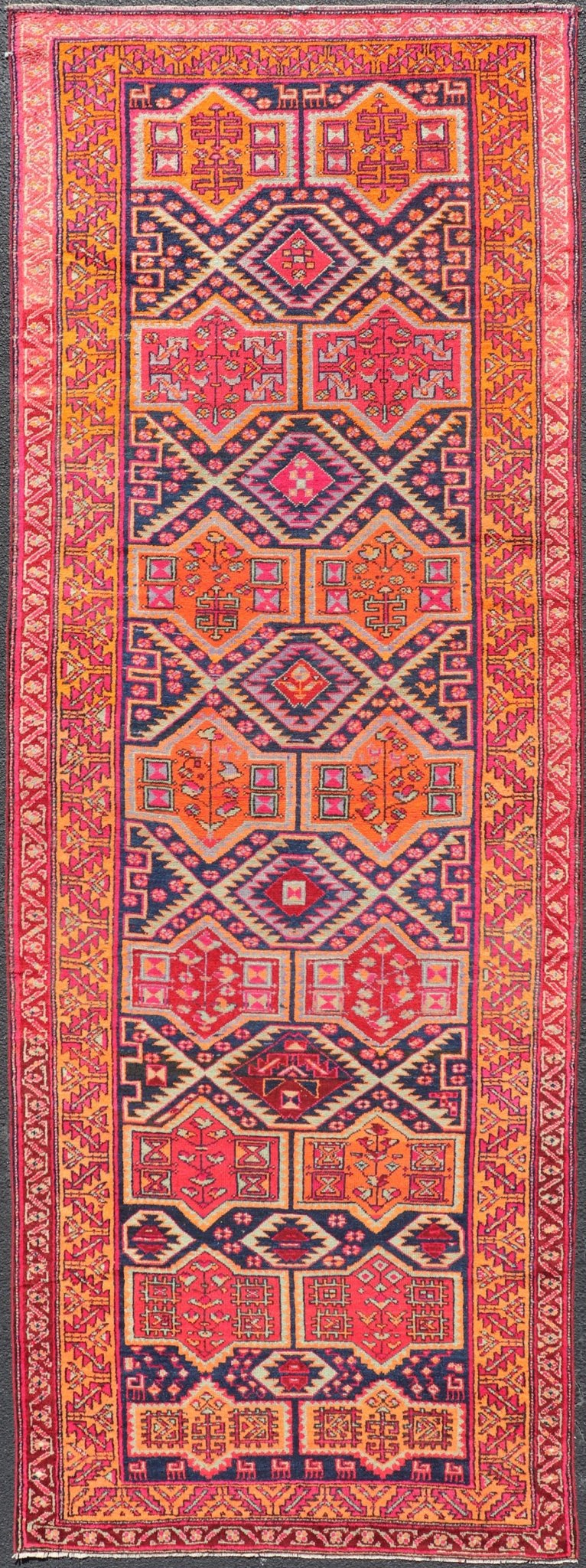 Antique Hand - Knotted Karajeh Gallery Rug in Wool with All - Over Geometric Design This antique Persian Karajeh gallery rug features an all - over sub - geometric design rendered in multicolor tones, set upon a navy blue background. A complementary, m... - Keivan Woven ArtsEMB - 9689 - P13526 - 16301Rug