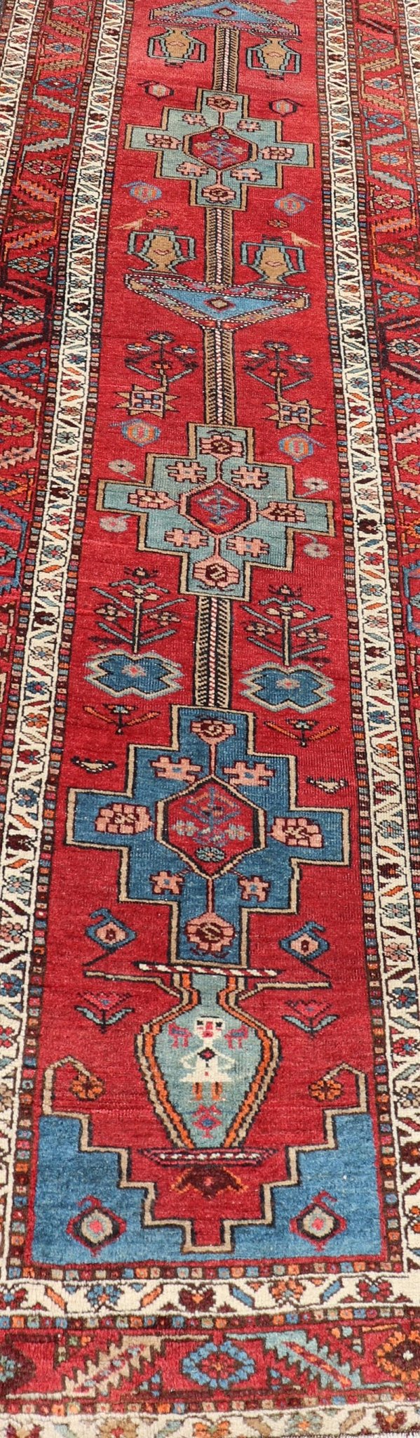Antique Persian Long Persian Serapi Runner in Wool with Medallion Design This antique Persian Serapi rug was hand - knotted in wool and features a sub - geometric medallion design rendered in multicolor. A complementary, multi - tiered border encompas... - Keivan Woven ArtsEMB - 9691 - P13533 - 16313Rug
