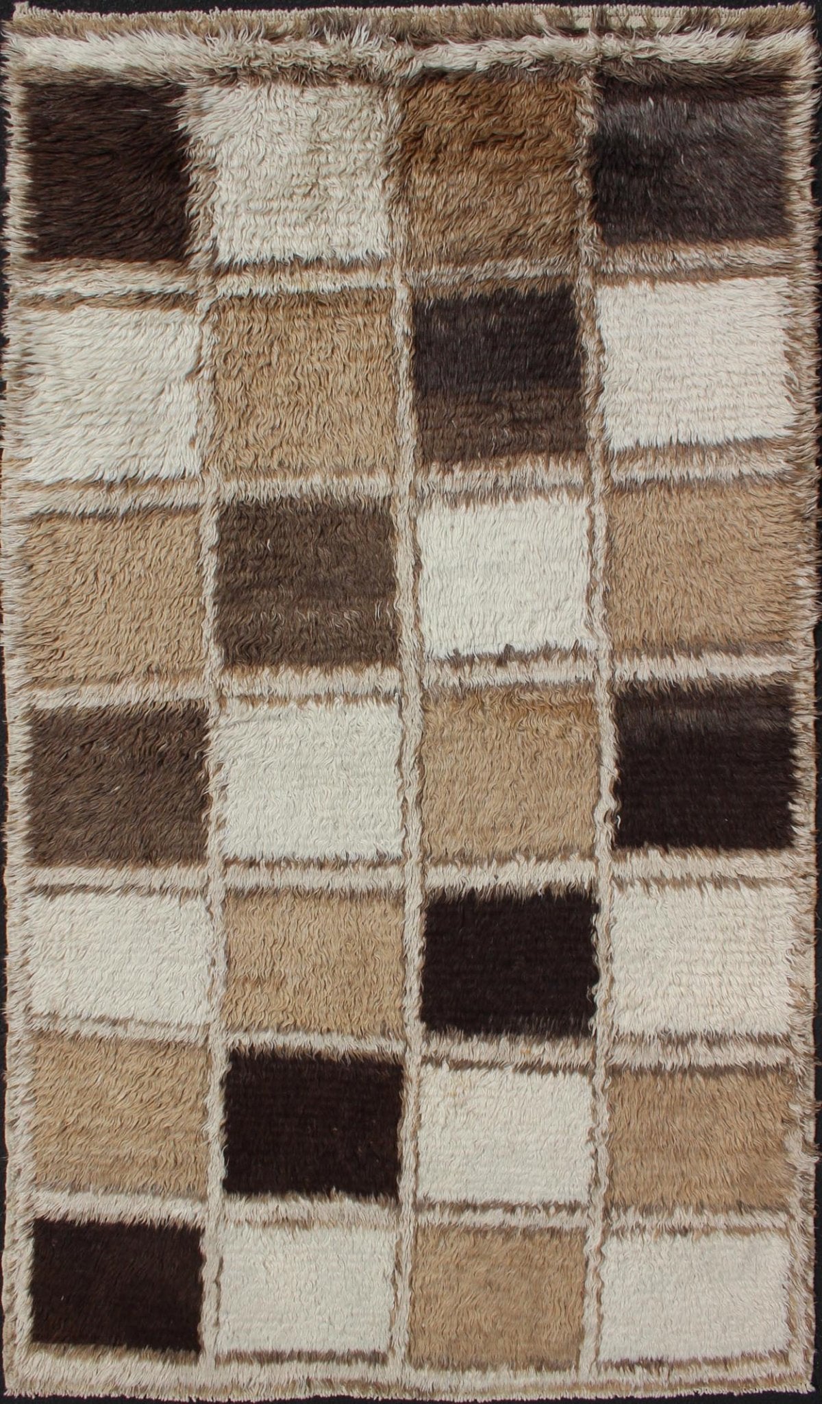 Mid Century Angora Wool Tulu This wonderful Turkish Tulu has a checkerboard pattern that is very unique. The colors are light brown, dark brown, tans, ivory, and light gray. A truly stunning piece. Measures: 4.0 x 7.7 - Keivan Woven ArtsEN - 112194 - 2770Rug
