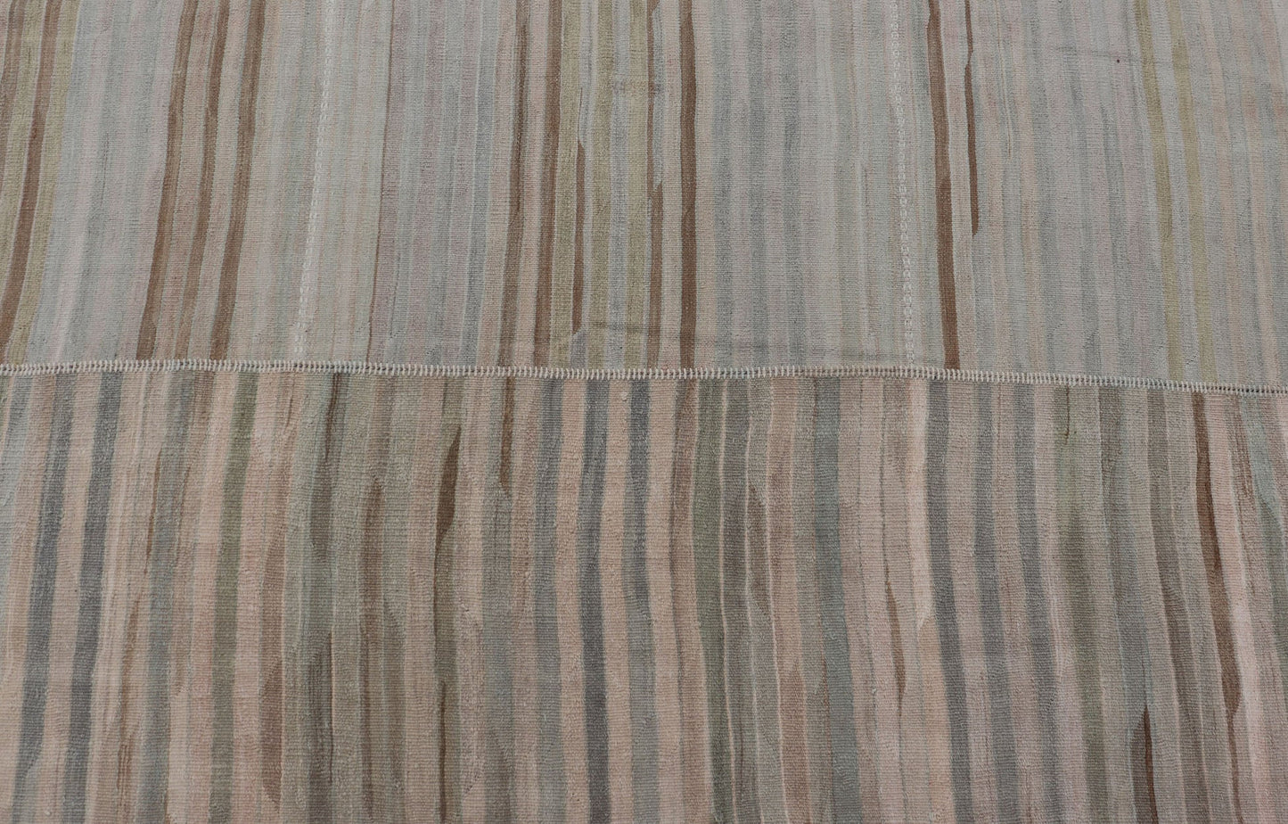 Measures: 9'9 x 16'6 Large Paneled Vintage Turkish Striped Kilim Rug in Soft Muted Colors. Keivan Woven Arts / Rug/EN - 13209, country of origin / type: Turkey / Kilim, circa 1950 Woven during the early - 20th century in Turkey, this Kilim is de... - Keivan Woven ArtsEN - 13209 - 22692Rug