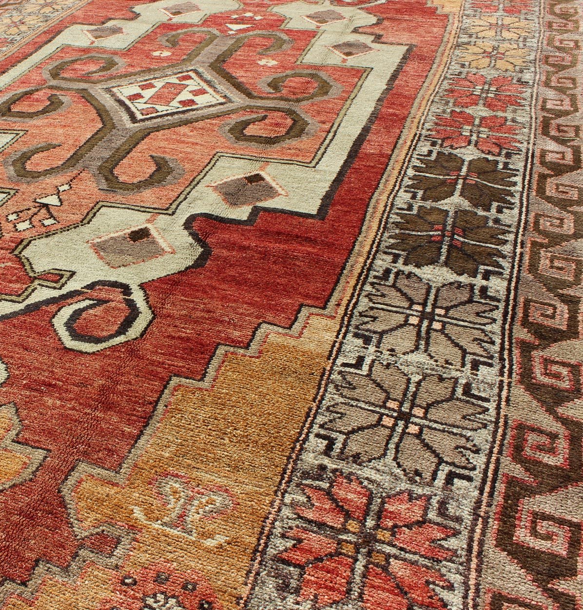 Vintage Turkish Oushak Rug with Geometric - Tribal Medallion in Red, Ivory & Gold This vintage Oushak rug features an intricate and complex design paired with a unique color combination. A geometric - tribal medallion spreads across the central fiel... - Keivan Woven ArtsEN - 140200 - 6037Rug