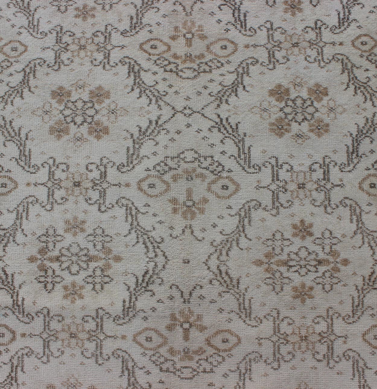 Vintage Turkish Oushak Carpet with Ivory Ground and Repeating Floral Design. Keivan Woven Arts / circa/1940 rug/ EN - 140436 Mid - 20th Century Vintage Oushak. Measures: 5'2 x 8'9. The design of this beautiful vintage Oushak rug from mid - 20th centu... - Keivan Woven ArtsEN - 140436 - 5664Rug