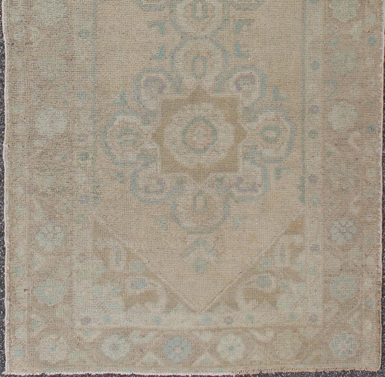 Floral medallion vintage Turkish Oushak runner with faded color palette, rug en - 140461, country of origin / type: Turkey / Oushak, circa 1930 This vintage Turkish Oushak gallery rug (1930) features a unique blend of colors and an intricately bea... - Keivan Woven ArtsEN - 140461 - 6049Rug