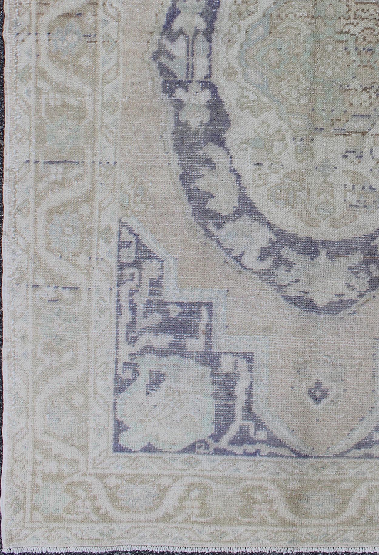 Vintage Medallion Oushak of Ottoman Design This unique medallion Oushak of Ottoman design displays a neutral color pallete with grey, cream, taupe, green and ivory tones. The bold design is softened by delicate and tone - on - tone colors. Measur... - Keivan Woven ArtsEN - 140476 - 6057Rug