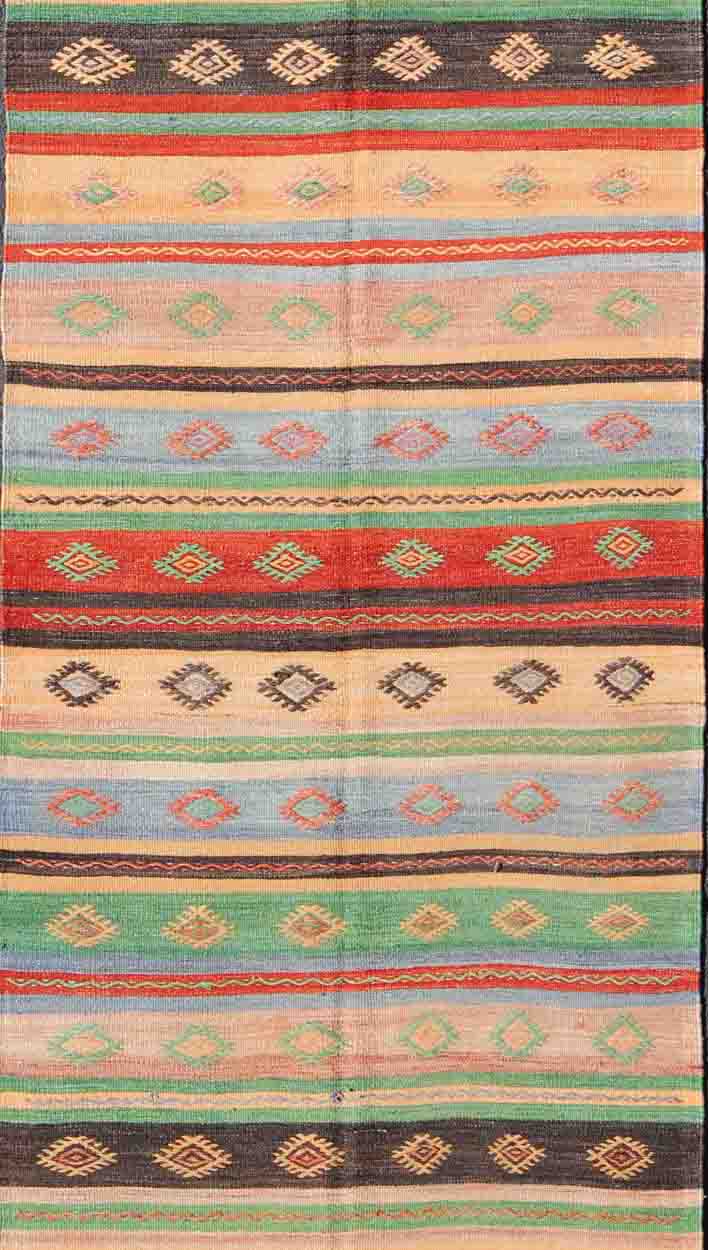 Vintage Turkish Kilim Carpet with Colorful Geometric Stripe Design. Vintage Hand - Knotted Turkish Kilim with Geometric Stripes, rug EN - 140519, country of origin / type: Turkey / Oushak, circa mid - 20th century. Featuring tribal shapes with a sp... - Keivan Woven ArtsEN - 140519 - 6061Rug