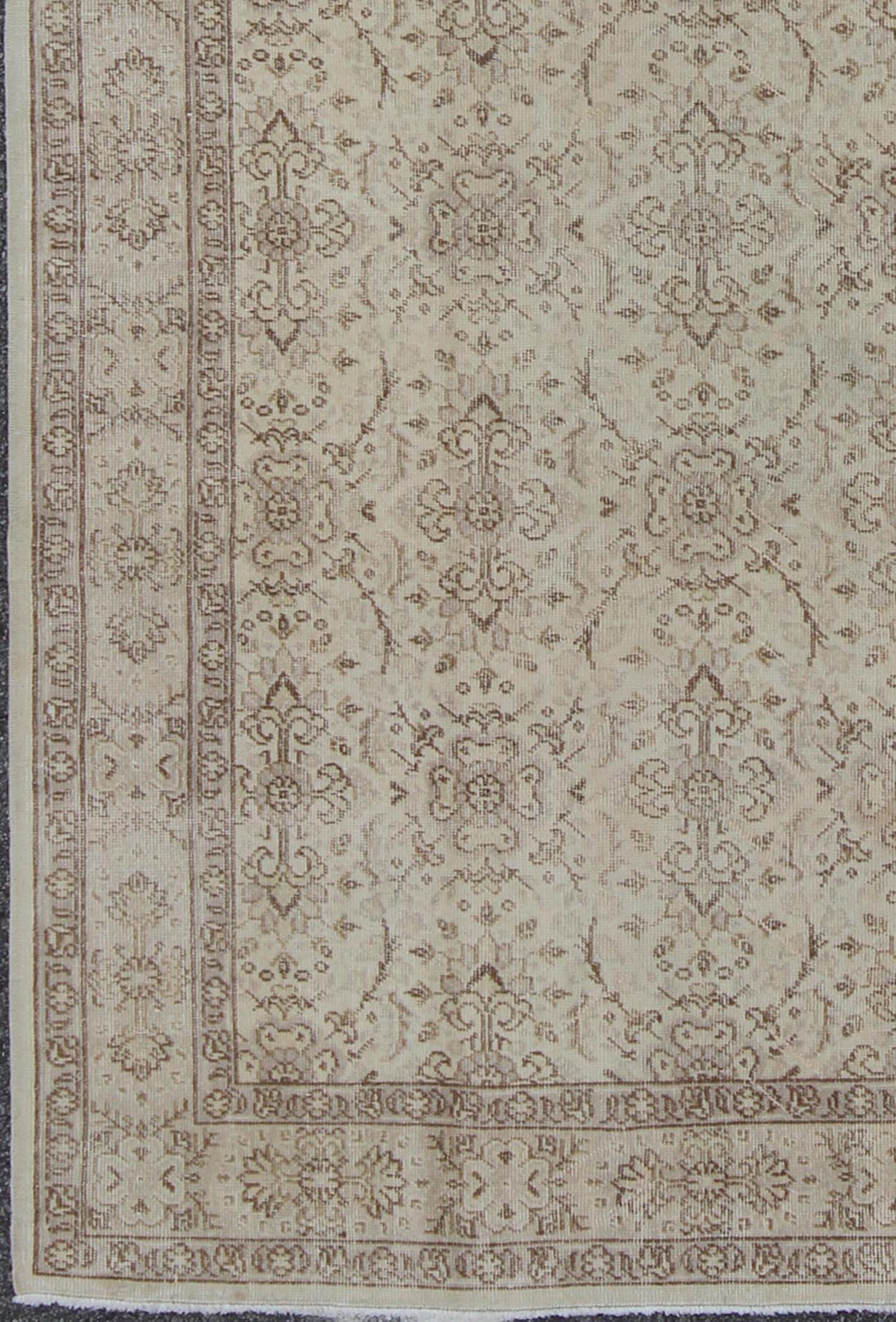 Vintage Turkish Oushak Carpet with Botanical Motifs Set on an Cream Ground Vintage Turkish Oushak Carpet with Botanical Motifs Set on an Ivory Ground Vintage Oushak. Keivan Woven Arts / Rug/EN - 140567. Mid - 20th Century Turkish. Measures: 5'7 ... - Keivan Woven ArtsEN - 140567 - 5700Rug